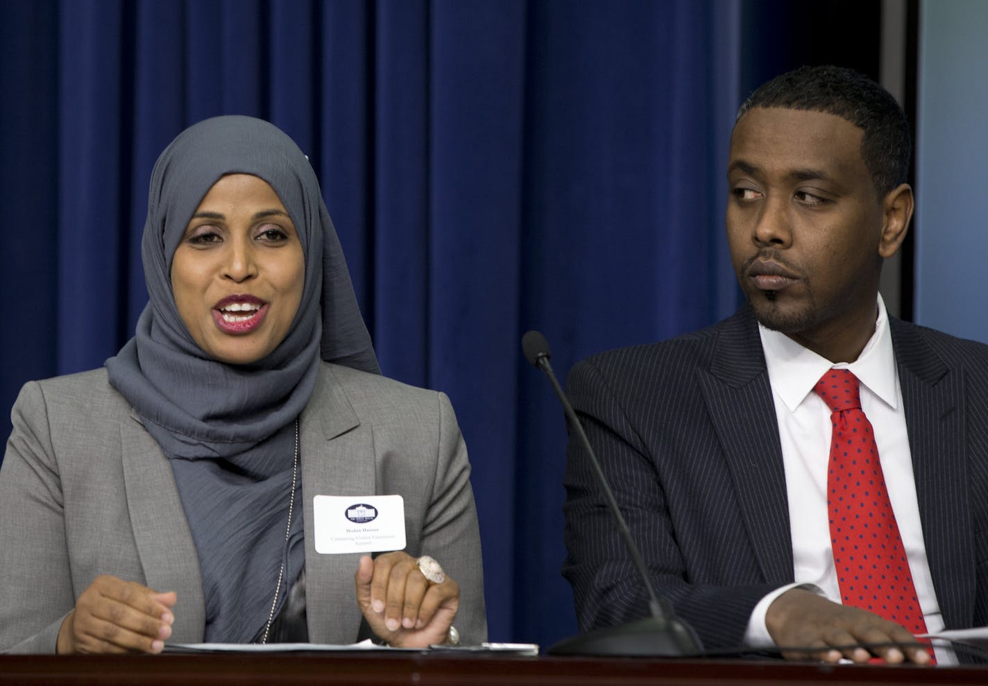 Hodan Hassan, Associate Vice President, Program Funding and Prospect Development at Save the Children US, left, and Minneapolis City Council Member Abdi Warsame, participate in the Minneapolis-St. Paul Pilot Program presentation during the White House Summit on Countering Violent Extremism, Wednesday, Feb. 18, 2015, in the South Court Auditorium of the Eisenhower Executive Office Building on the White House Complex in Washington. (AP Photo/Carolyn Kaster)