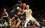 Minnesota Golden Gophers guard Carlie Wagner (33) passed the ball to a teammate at Williams Arena Sunday Feb 18, 2018 in Minneapolis, MN.