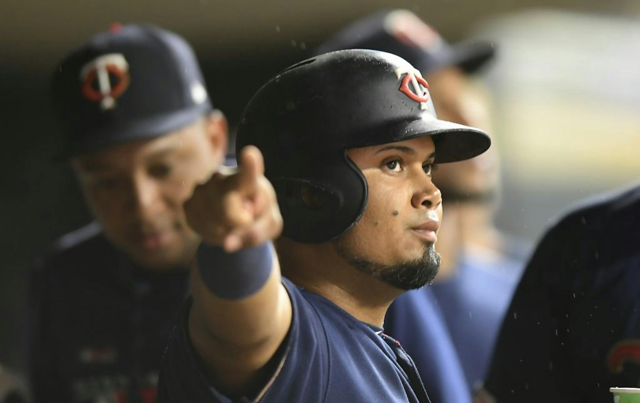 Minnesota Twins second baseman Luis Arraez (2) celebrated after scoring a run in the bottom of the fourth inning off a single hit by first baseman C.J. Cron (24) against the Cleveland Indians.