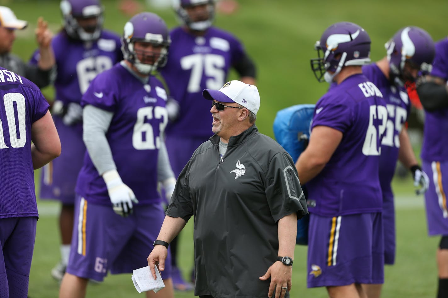 Vikings offensive line coach Tony Sparino worked with the line during OTA training at Winter Park in June.