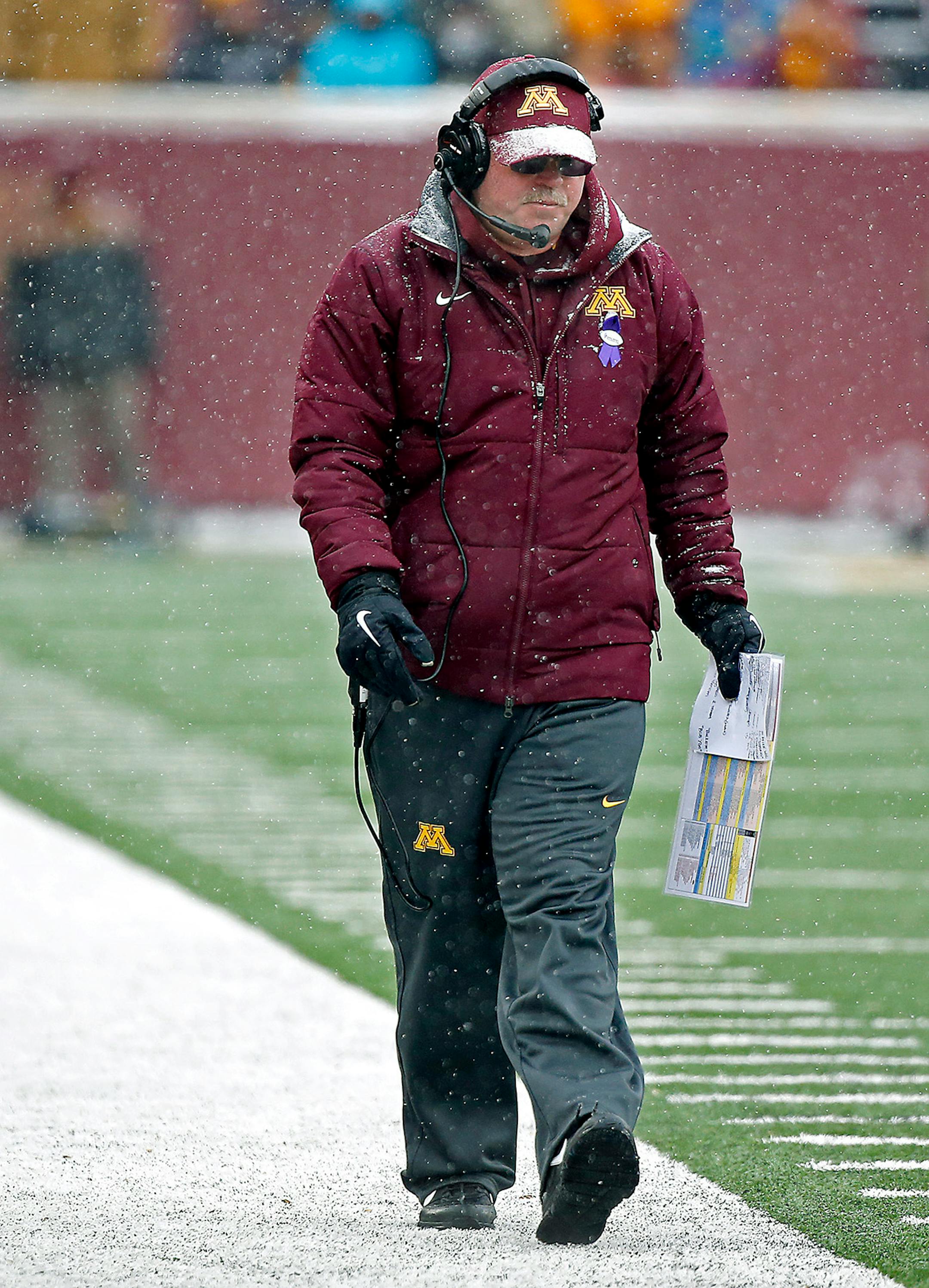 Minnesota's Jerry Kill walked the sideline in the fourth quarter during the game against Ohio State, Saturday, November 15, 2014 at TCF Bank Stadium in Minneapolis, MN.