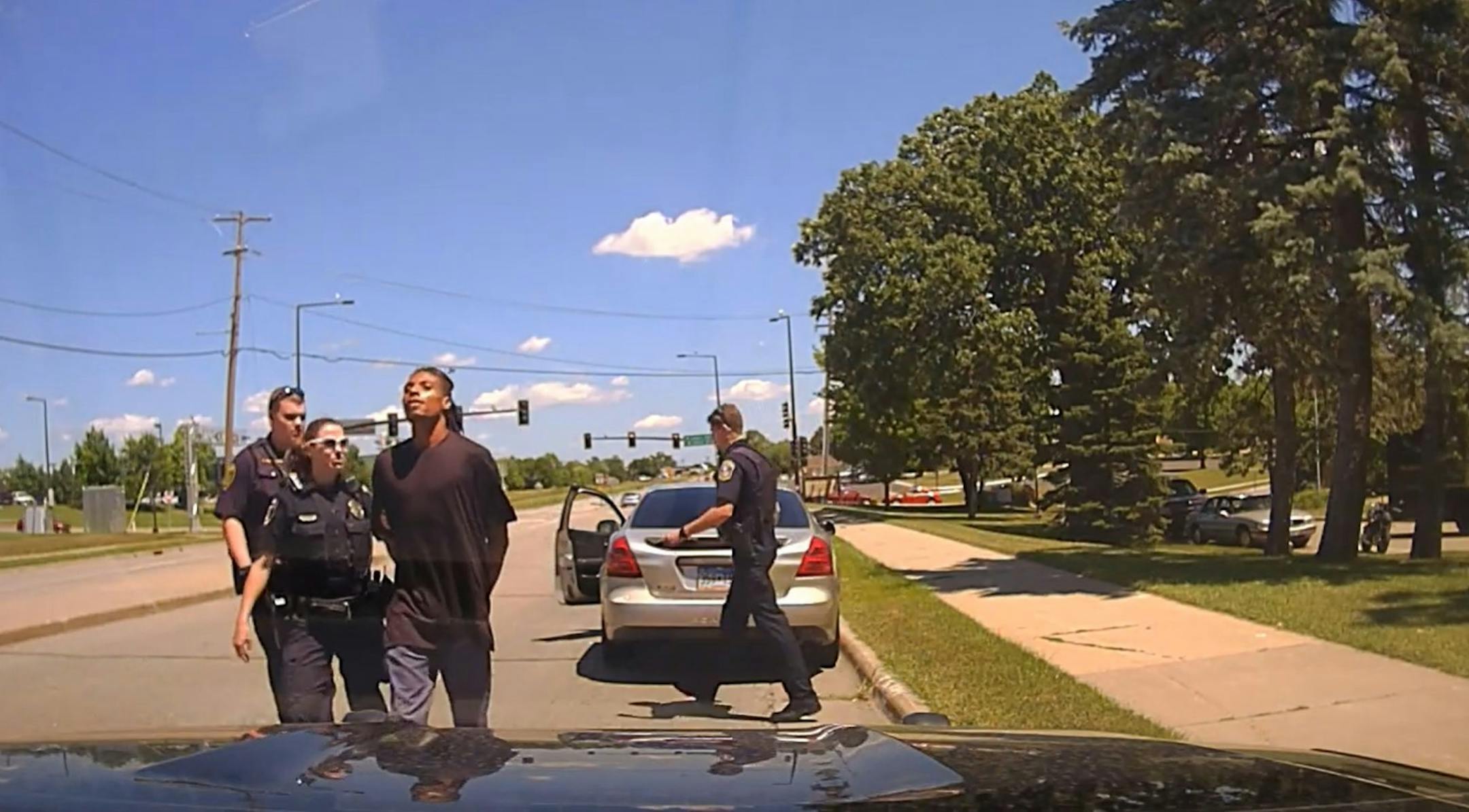 Police led Darrius Strong back to his car after a traffic stop Friday afternoon.