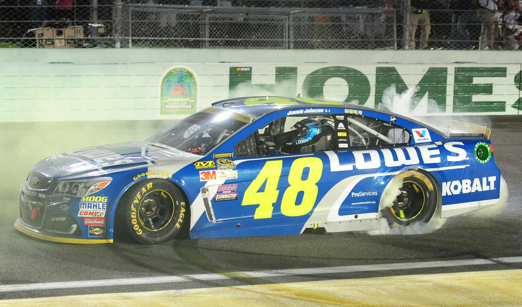 Jimmie Johnson celebrates winning the Ford EcoBoost 400 NASCAR Sprint Cup Championship race on Sunday, Nov. 20, 2016 at Homestead-Miami Speedway in Florida. (Joe Cavaretta/Sun Sentinel/TNS) ORG XMIT: 1193445