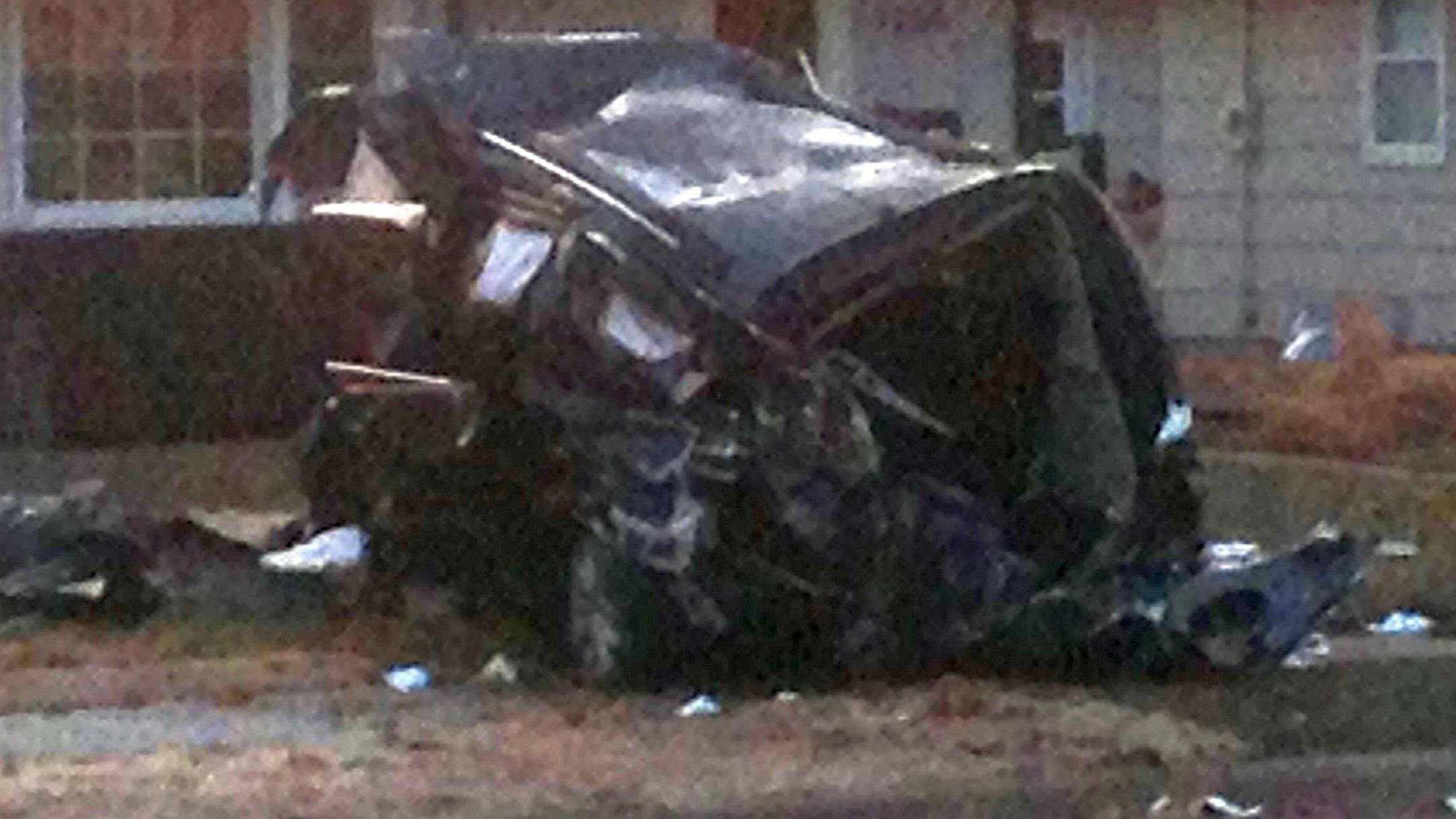 The aftermath of a police pursuit that ended with a van striking a house in the 7200 block of Bloomington Avenue S. in Richfield.