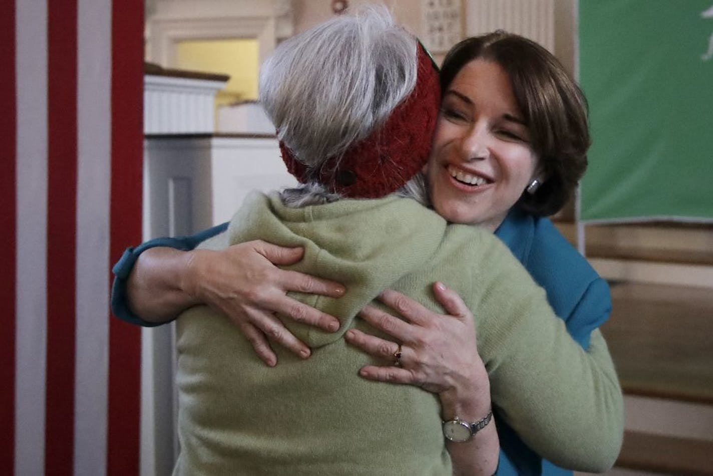 Democratic presidential candidate Sen. Amy Klobuchar, D-Minn., hugs a woman after speaking at a campaign event, Tuesday, Feb. 4, 2020, in Portsmouth, N.H.