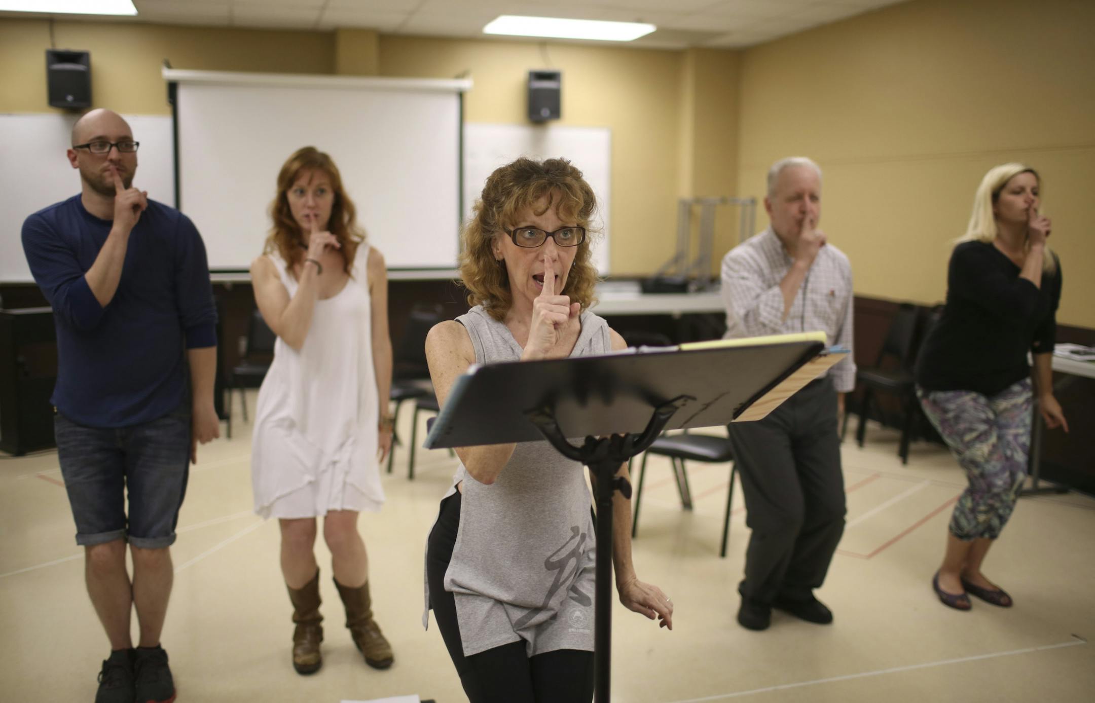 Adam Qualls, Sandra Struthers, Gary Briggle, and Ruthie Baker, rear, from left, learned the choreography of a number in "Glensheen" from Tinia Moulder.