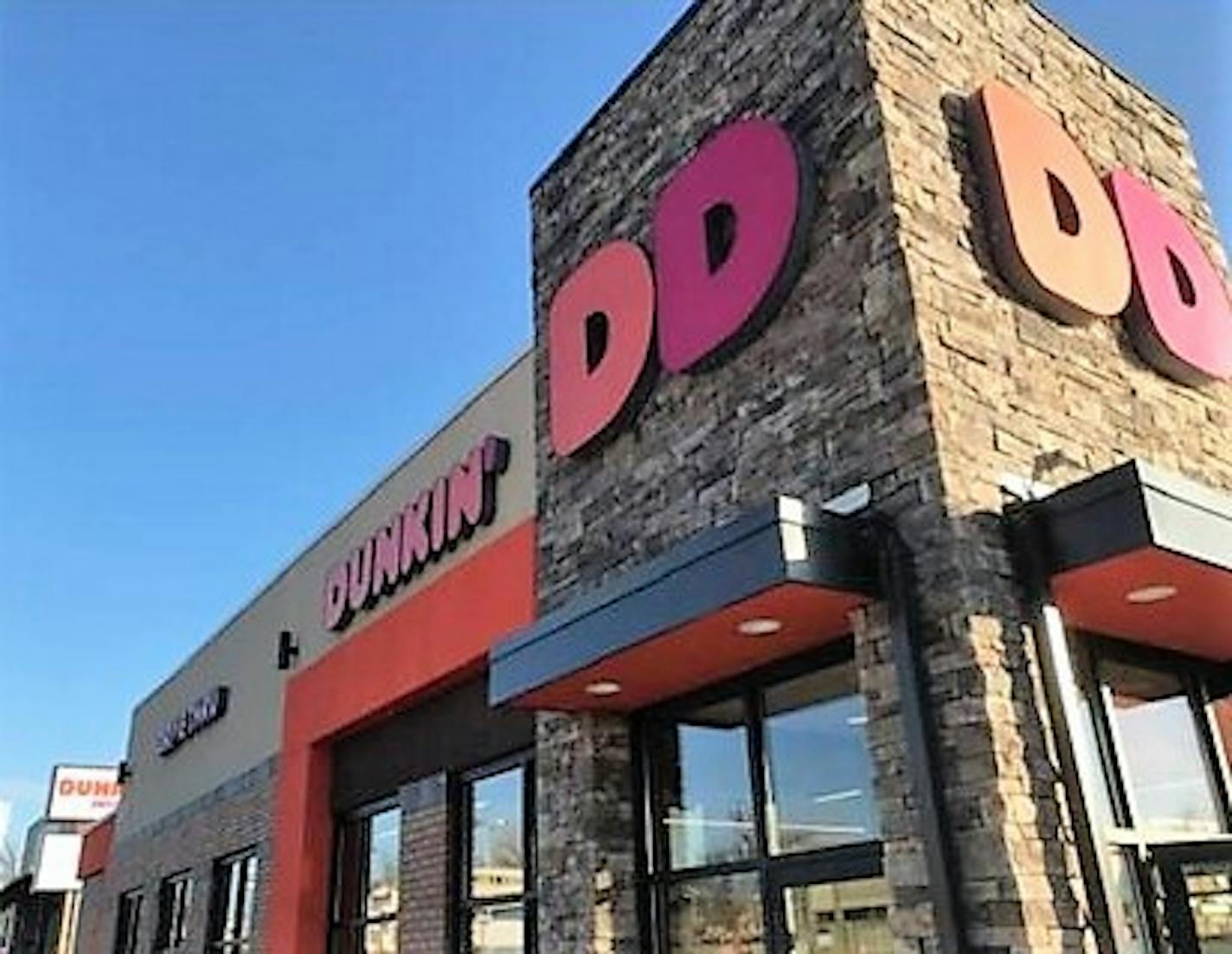 The new Dunkin' location in Richfield is the first in the Twin Cities with the restaurant chain's new stripped-down identity and dressed-up layout.