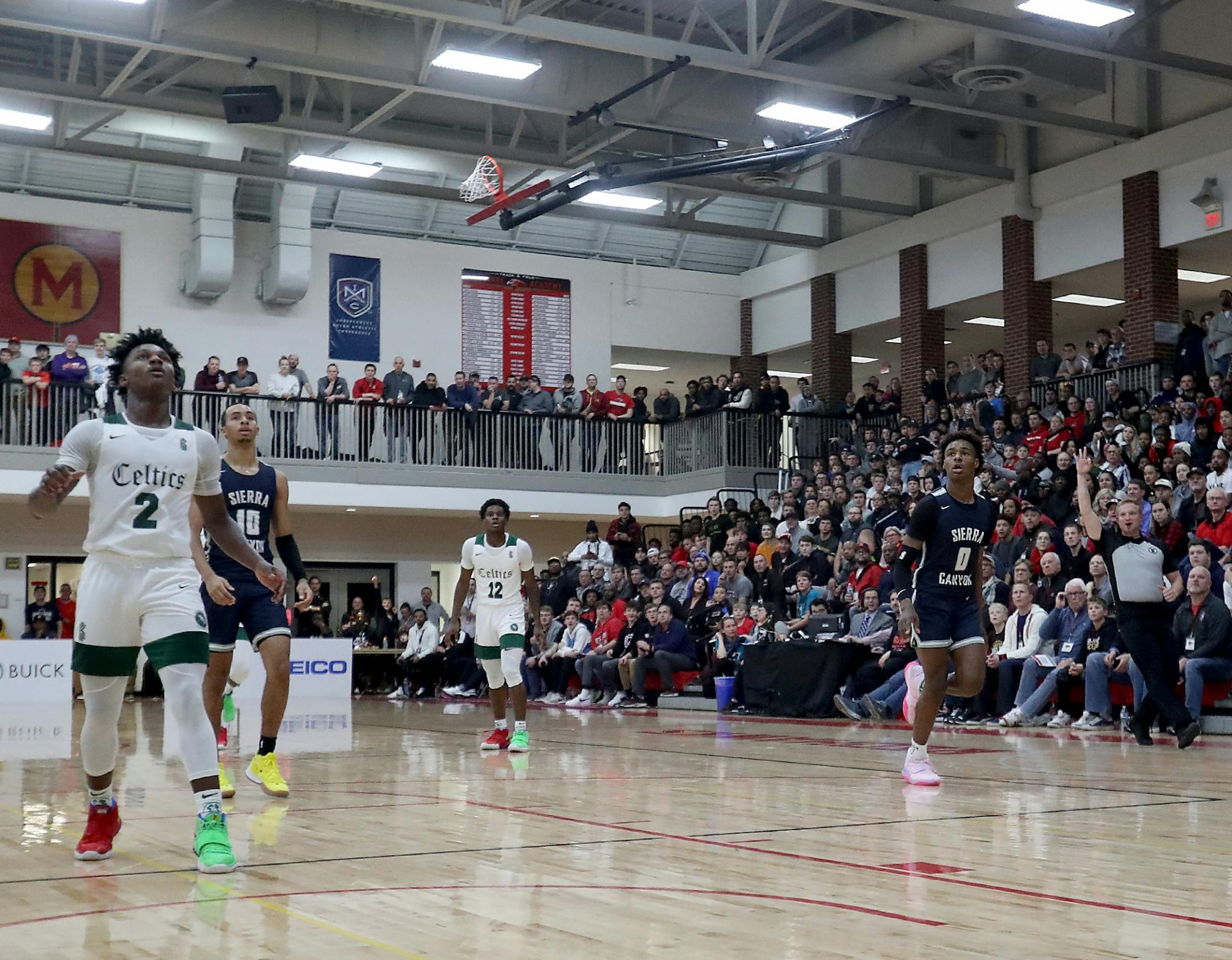 Bronny James, right, of Sierra Canyon, follows through on a last second first half shot against Patrick School Friday, Jan. 3, 2020, at Minnehaha Academy in Minneapolis MN.
