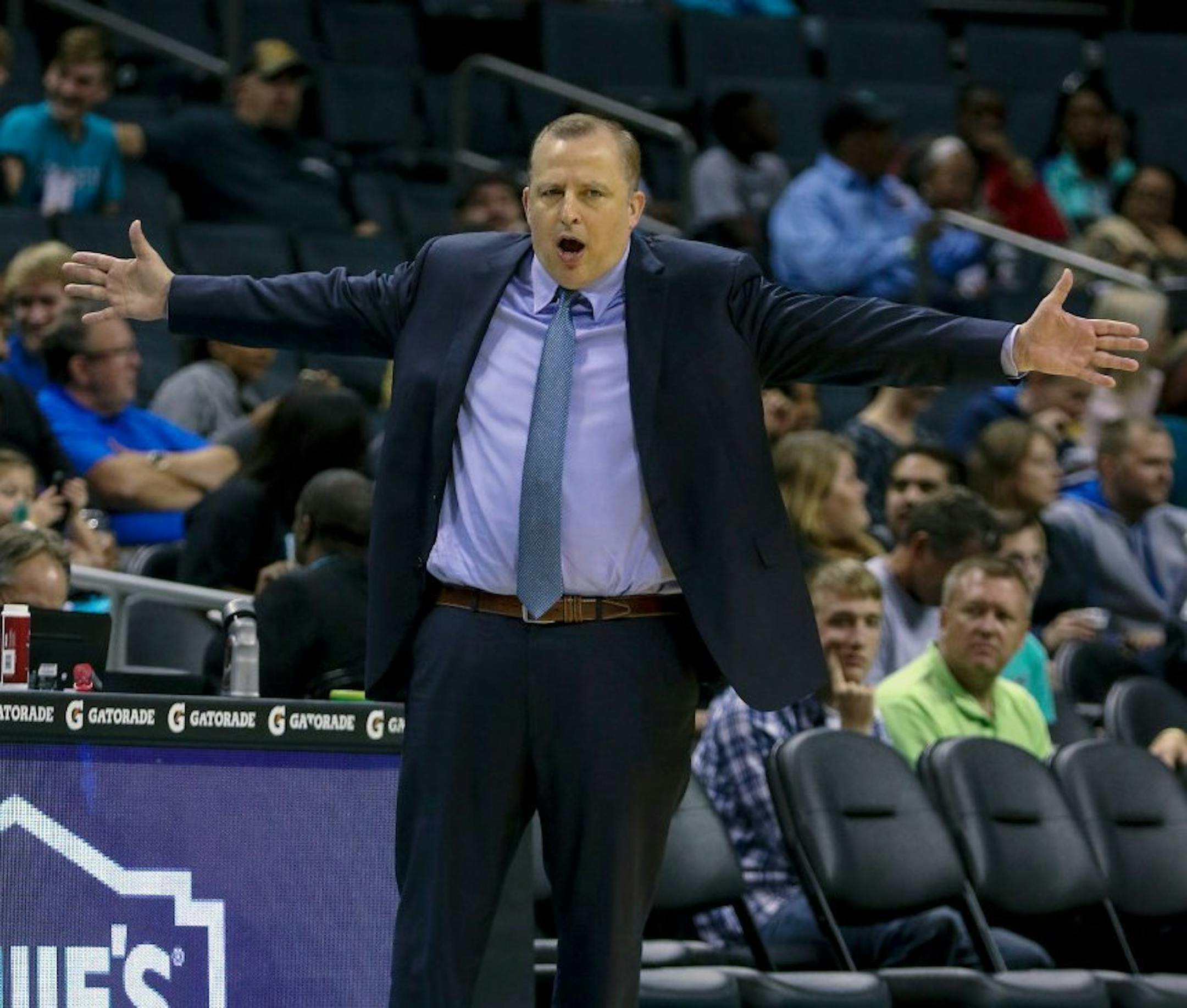 Timberwolves coach Tom Thibodeau argues a call as his team plays the Charlotte Hornets in the first half of a preseason game in Charlotte