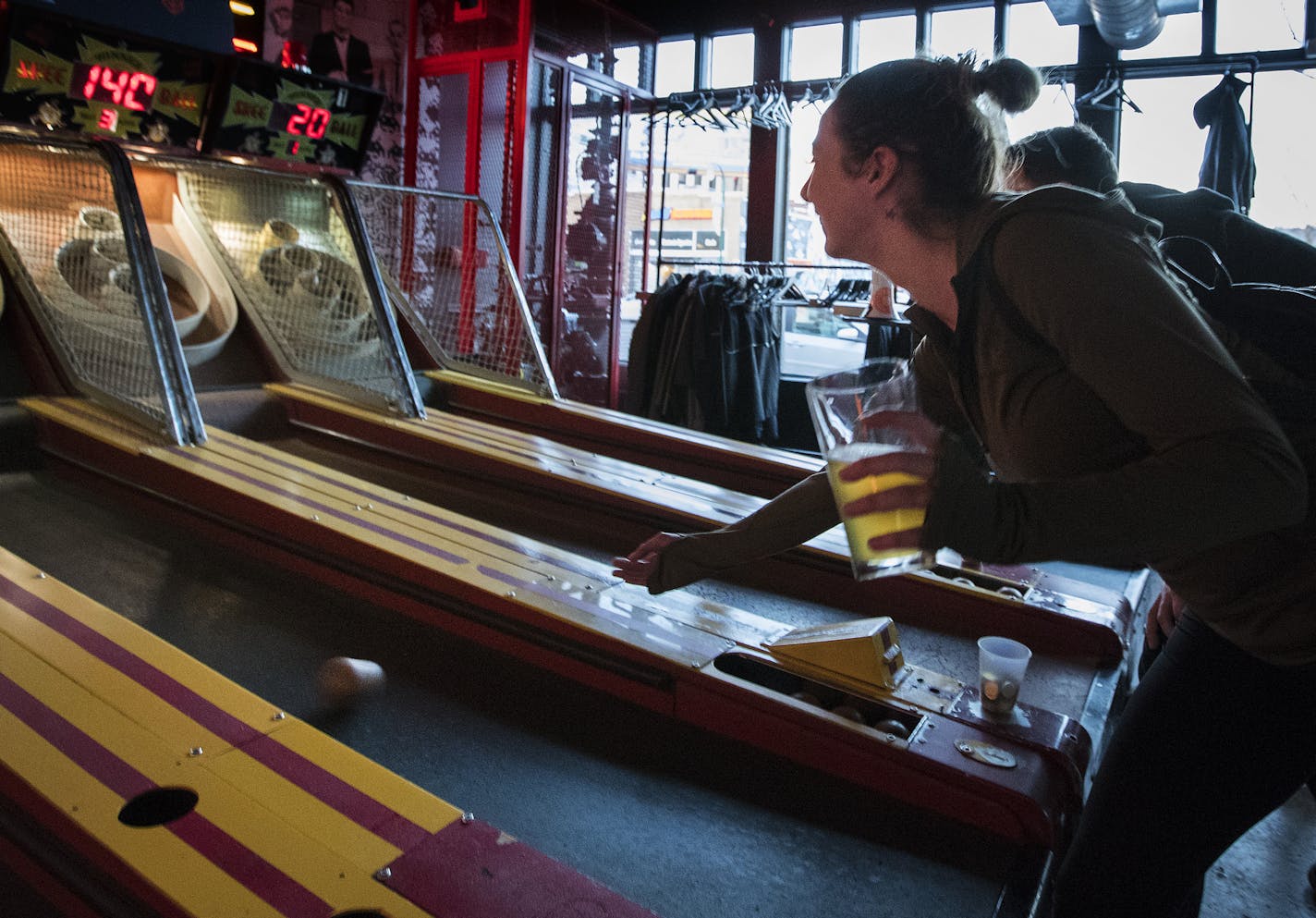 Marie Bushbaum, 34, of Minneapolis played Skee-Ball at arcade bar Up-Down in south Minneapolis.