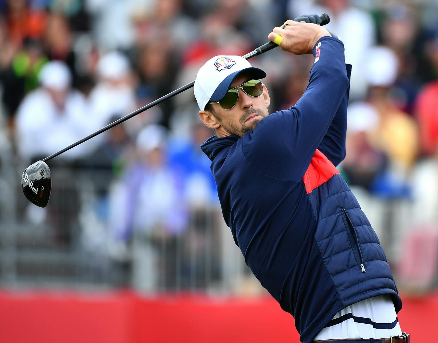 23-time Olympic Gold Medalist Michael Phelps teed off from the first hole during the Ryder Cup Celebrity Match Tuesday. ] (AARON LAVINSKY/STAR TRIBUNE) aaron.lavinsky@startribune.com Team USA and Team Europe practiced for the Ryder Cup at Hazeltine National Golf Club on Tuesday, Sept. 27, 2016 in Chaska, Minn.