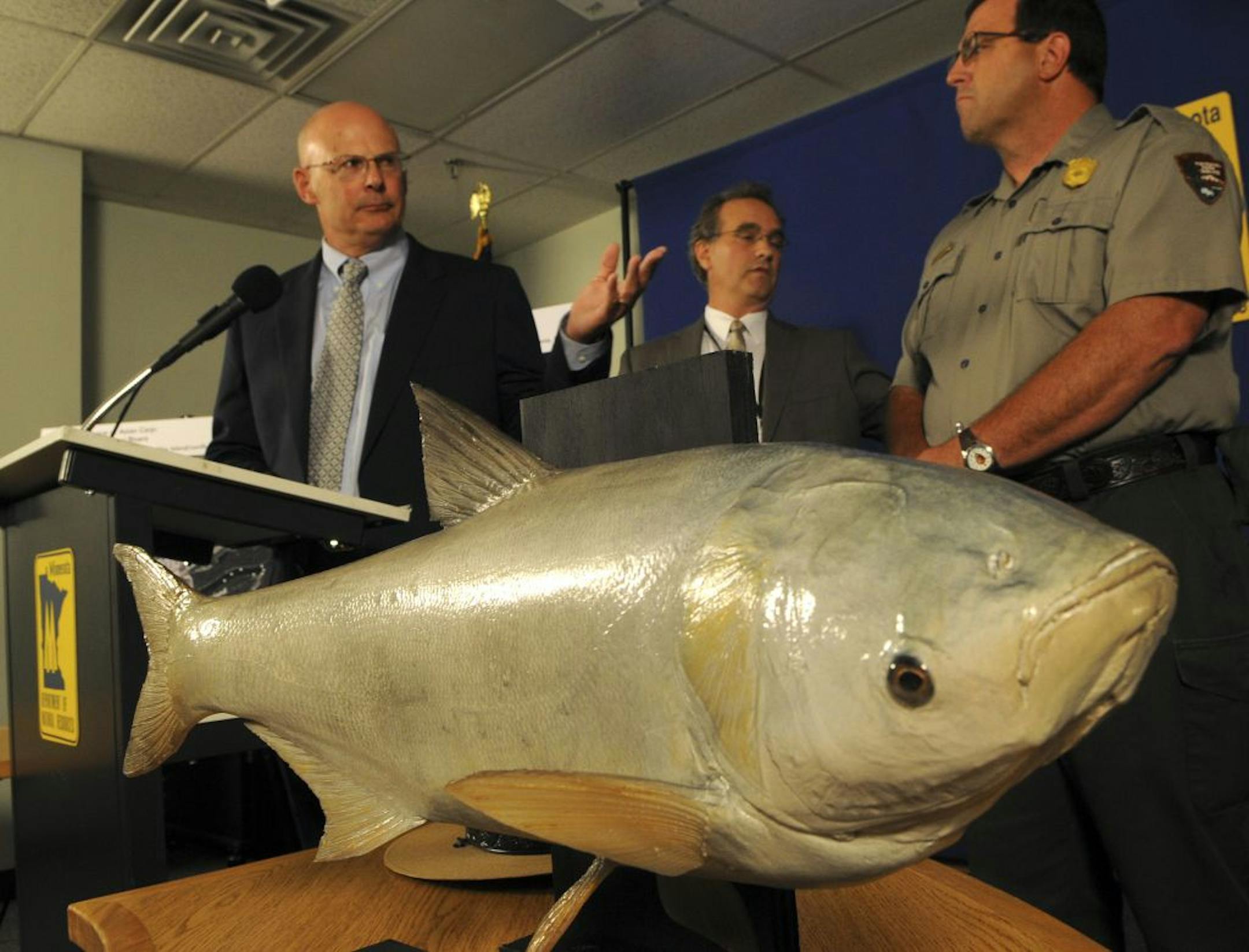 DNR Commissioner Tom Landwehr (left)