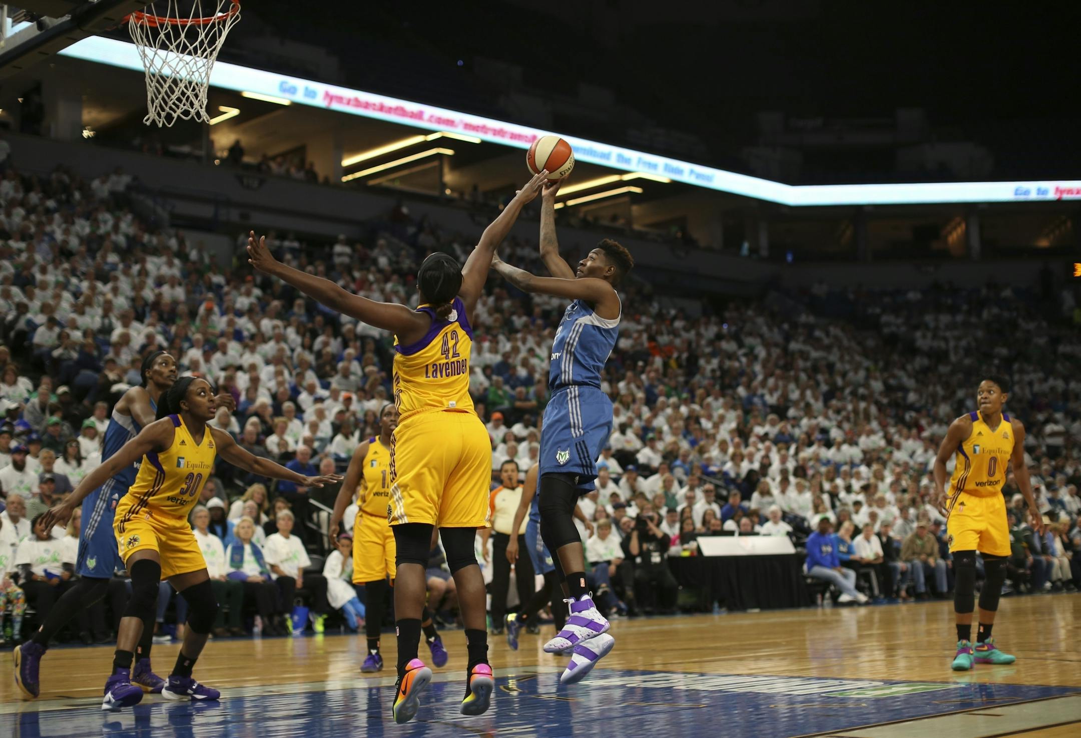 Minnesota Lynx forward Natasha Howard (3) shot over Los Angeles Sparks center Jantel Lavender (42) in the second half.