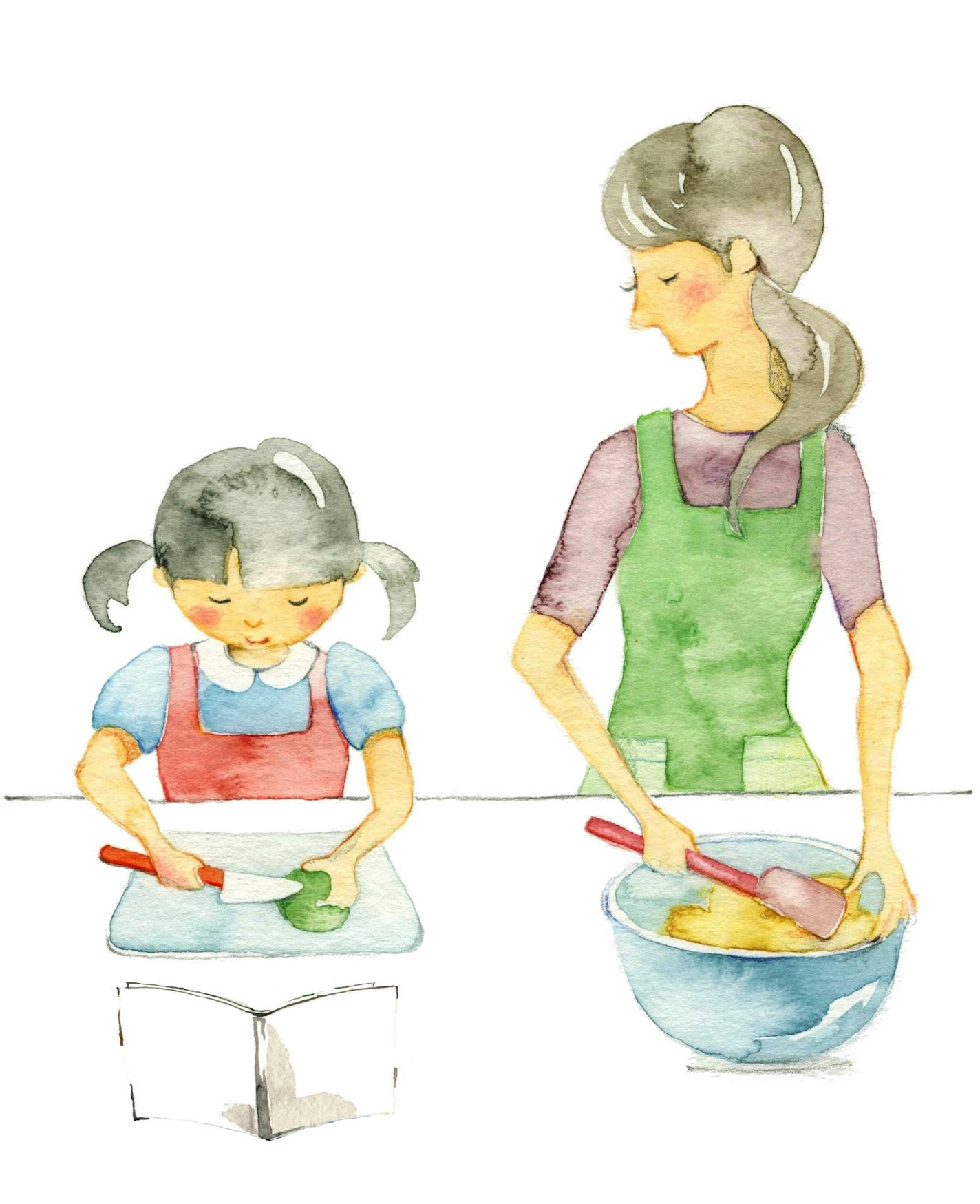 Mother and daughter cooking. istock