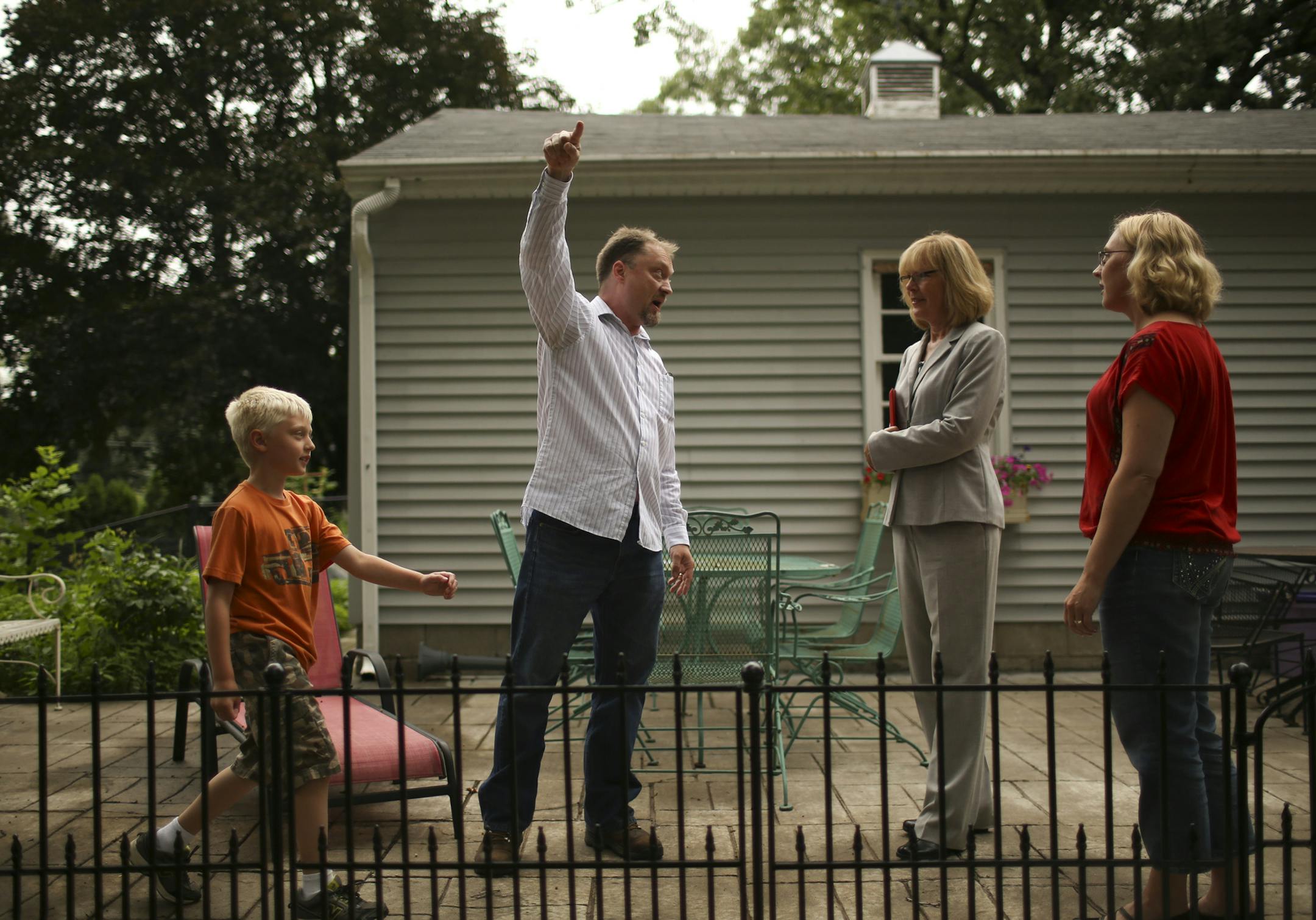 A growing number of people who lost lost their homes through foreclosure during the darkest days of the recession are doing something they never could have imagined: they're becoming homeowners again. Realtor Cheryl Kempenich showed a home in Shoreview to her brother-in-law, Jerry Kempenich and his family Tuesday afternoon, July 30, 2013. Jerry Kempenich, left, and his wife, Jennifer, right, spoke with their realtor Cheryl Kempenich on the patio while their son, Henry, 8, returned from exploring