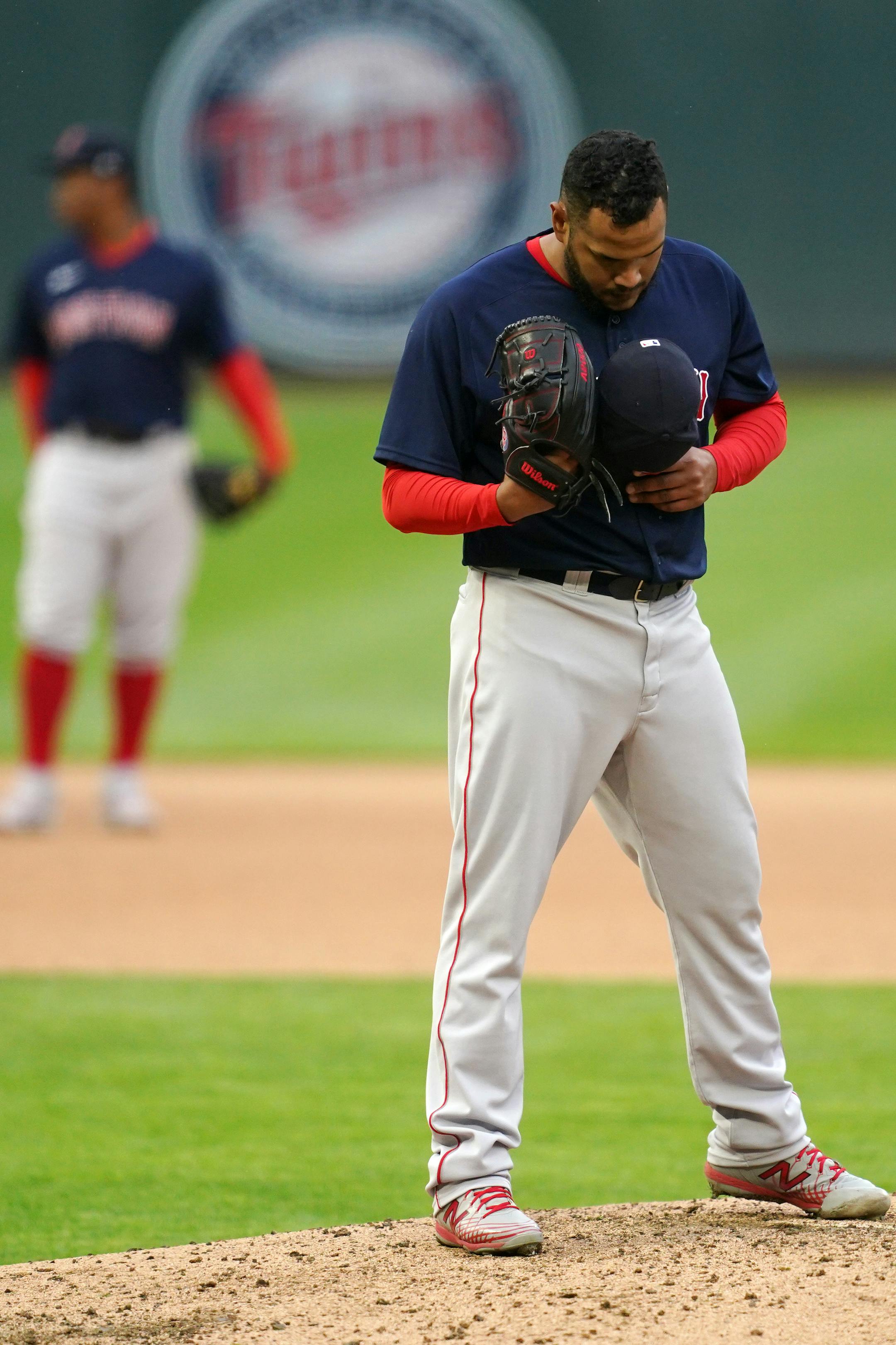 Boston Red Sox starting pitcher Eduardo Rodriguez (57) took a moment to himself in the fourth inning of the second game.