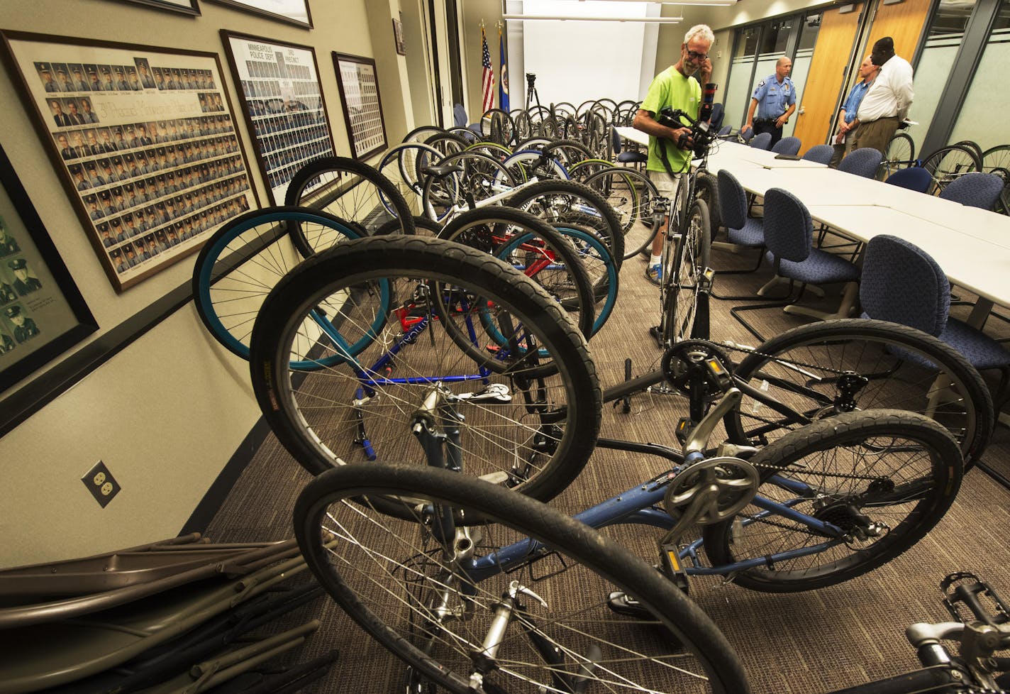 Minneapolis police display 44 stolen bikes they nabbed in a single raid.