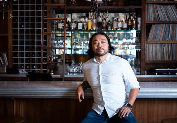Chef/ owner Hai Truong pictured in front of the bar at Ngon Bistro in 2020.