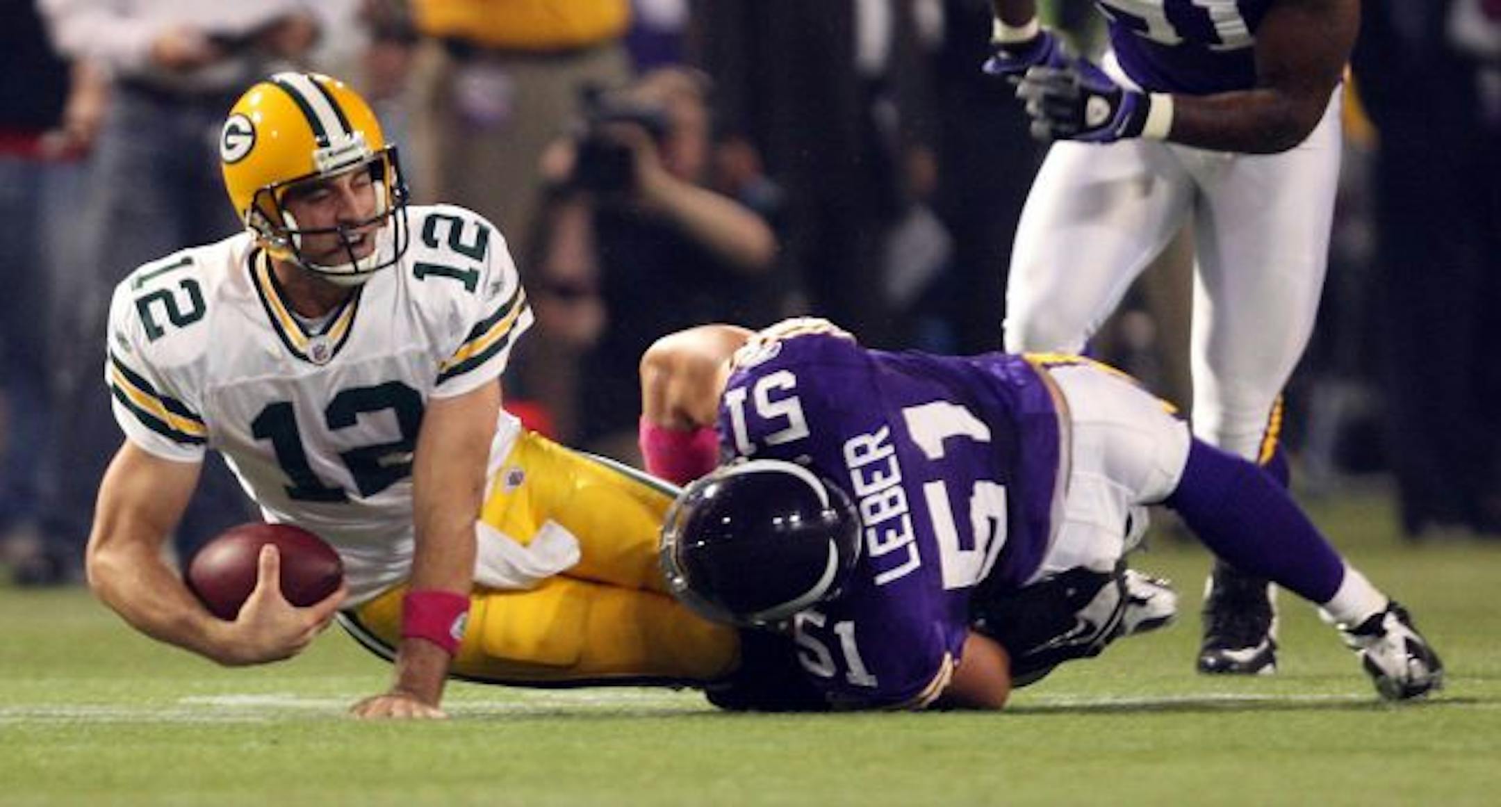 Ben Leber sacked Aaron Rogers at the start of the second half.