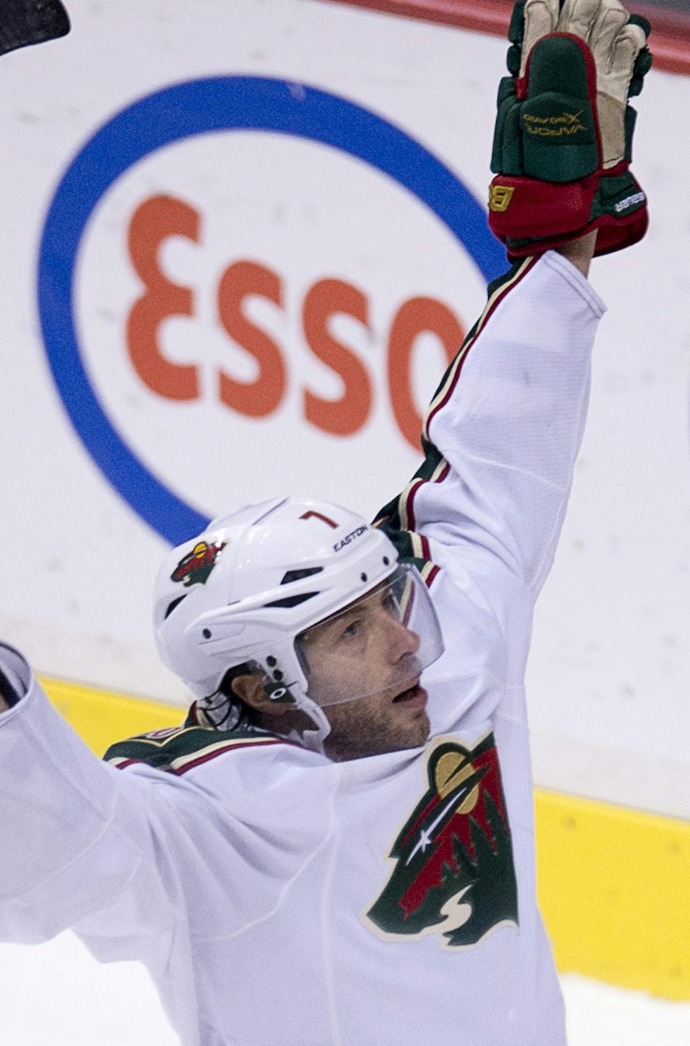 Minnesota Wild center Matt Cullen (7) celebrates his goal during third period NHL hockey action against the Vancouver Canucks at Rogers Arena in Vancouver, British Columbia Monday, March,18, 2013. (AP Photo/The Canadian Press, Jonathan Hayward) ORG XMIT: MIN2013031918134116