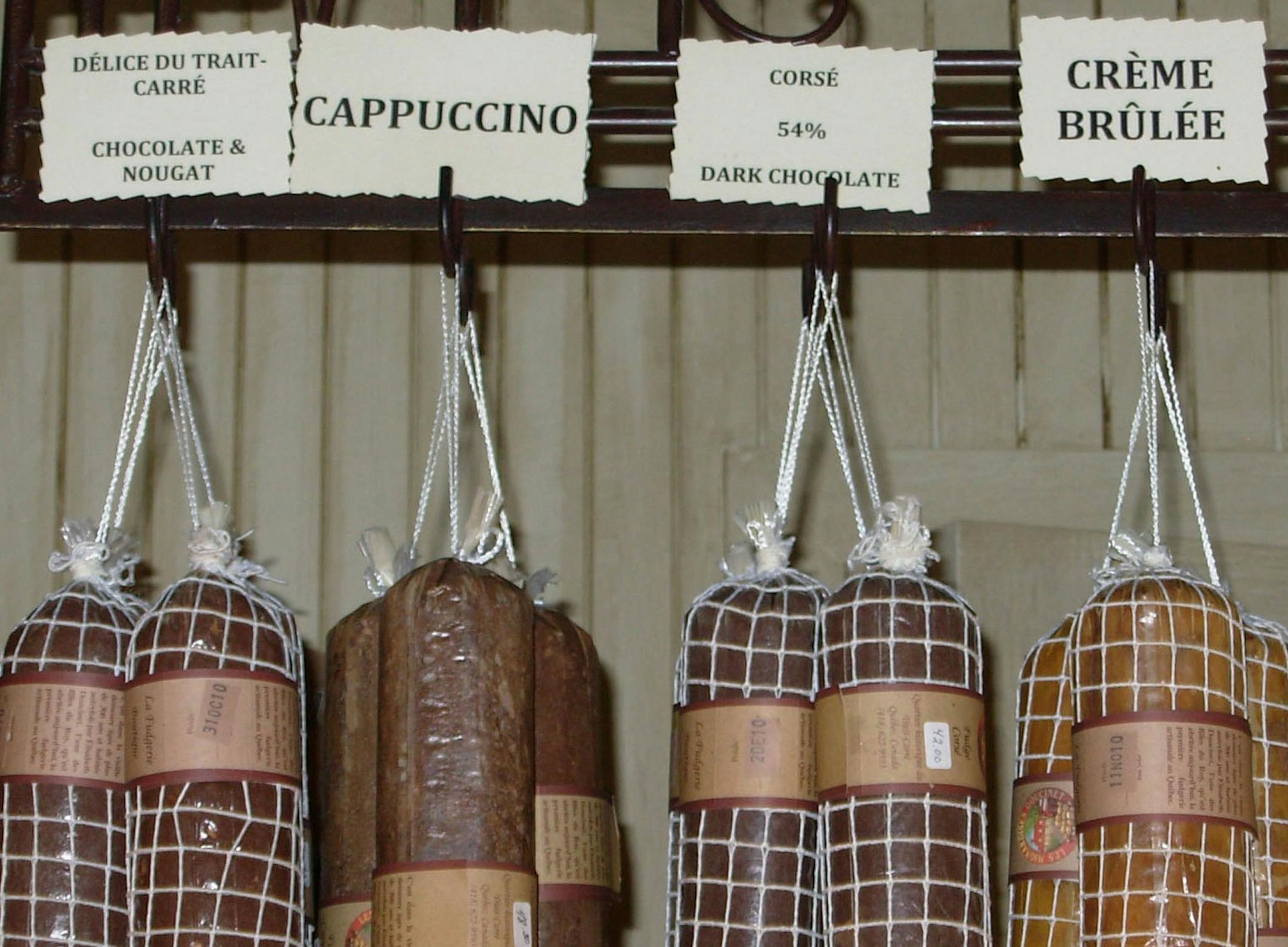 Chocolate sausages hang in La Fudgerie in Quebec. (Helen Anders/AUSTIN AMERICAN-STATESMAN)