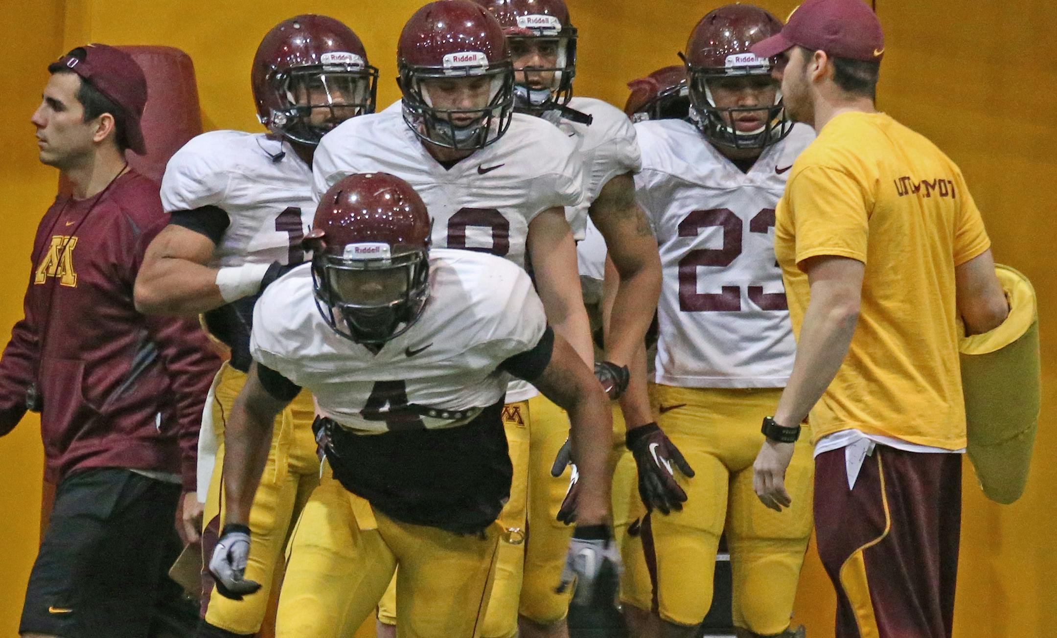 (center) University of Minnesota Football Wide Receiver #4, KJ Maye ran drills during indoor practice on 4/6/13.] Bruce Bisping/Star Tribune bbisping@startribune.com KJ Maye/roster.