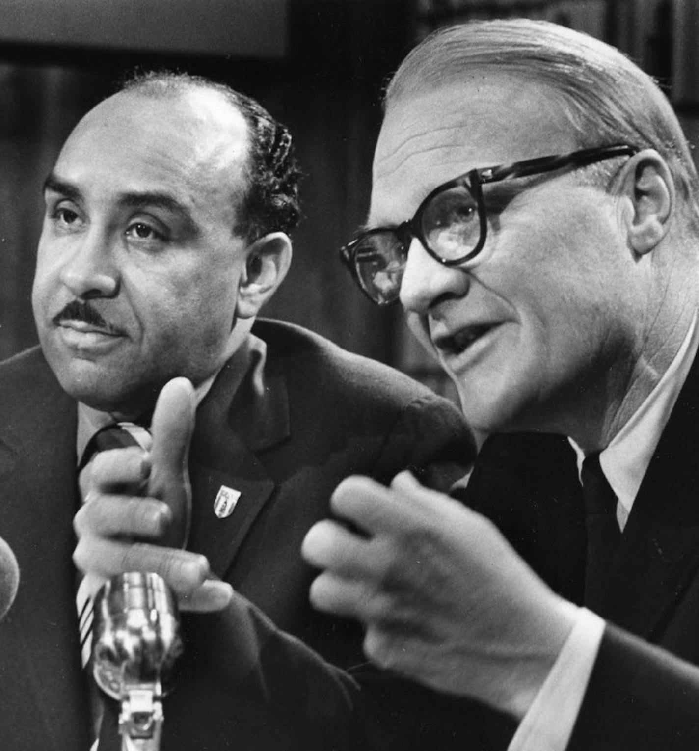 In this 1970 photo, Philip Harder and Harry Davis of the Urban Coalition announce the results of a report on a police shooting.