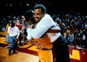 January 27, 1989 Gophers coach Clem Haskins gleefully embraced Willie Burton, who paced the upset with 20 points and 13 rebounds. Brian Peterson, Minn