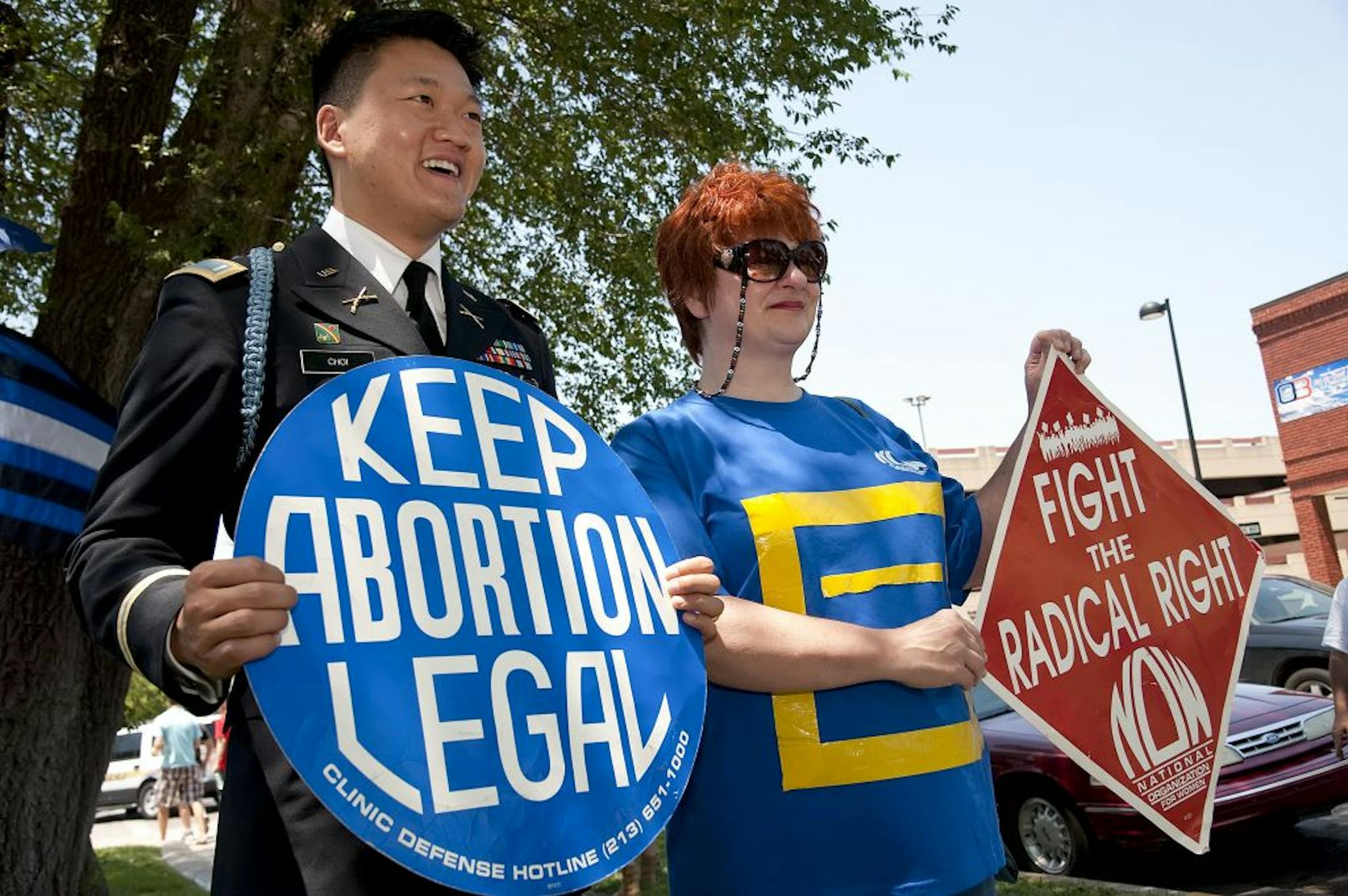 Dr. Mila Means, a physician trying to open an abortion clinic, right, with Dan Choi, a gay-rights activist, at a rally sponsored by the Kansas Equality Coalition in Wichita, Kan., June 26, 2011. In a city where the last abortion provider was fatally shot two years ago, Means has emerged as potential replacement, but faces her own challenges.