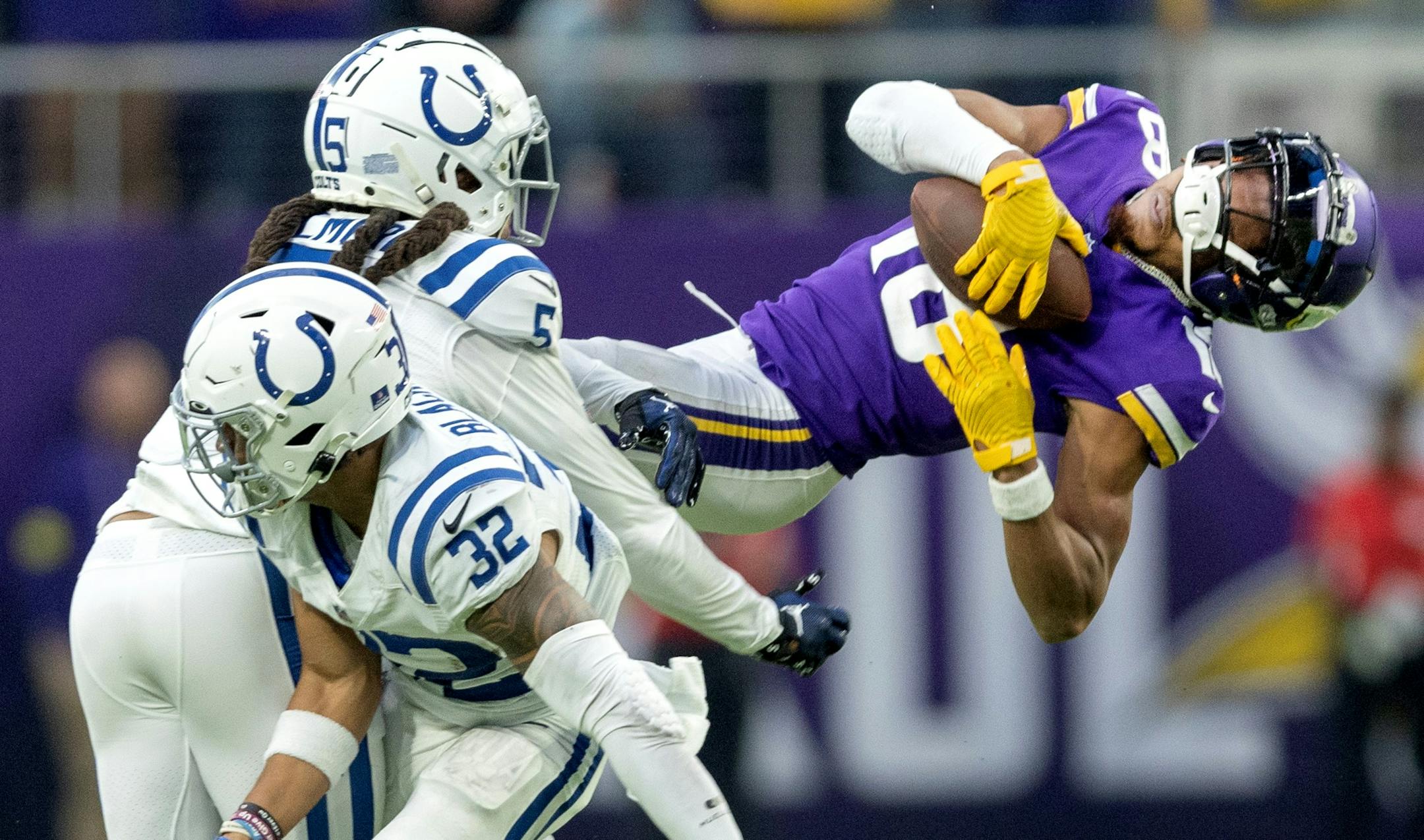 Stephon Gilmore (5) of the Indianapolis Colts is called for a penalty after a hit on Justin Jefferson (18) of the Minnesota Vikings in the fourth quarter Saturday, December 17, 2022, at U.S. Bank Stadium in Minneapolis, Minn. ] CARLOS GONZALEZ • carlos.gonzalez@startribune.com.