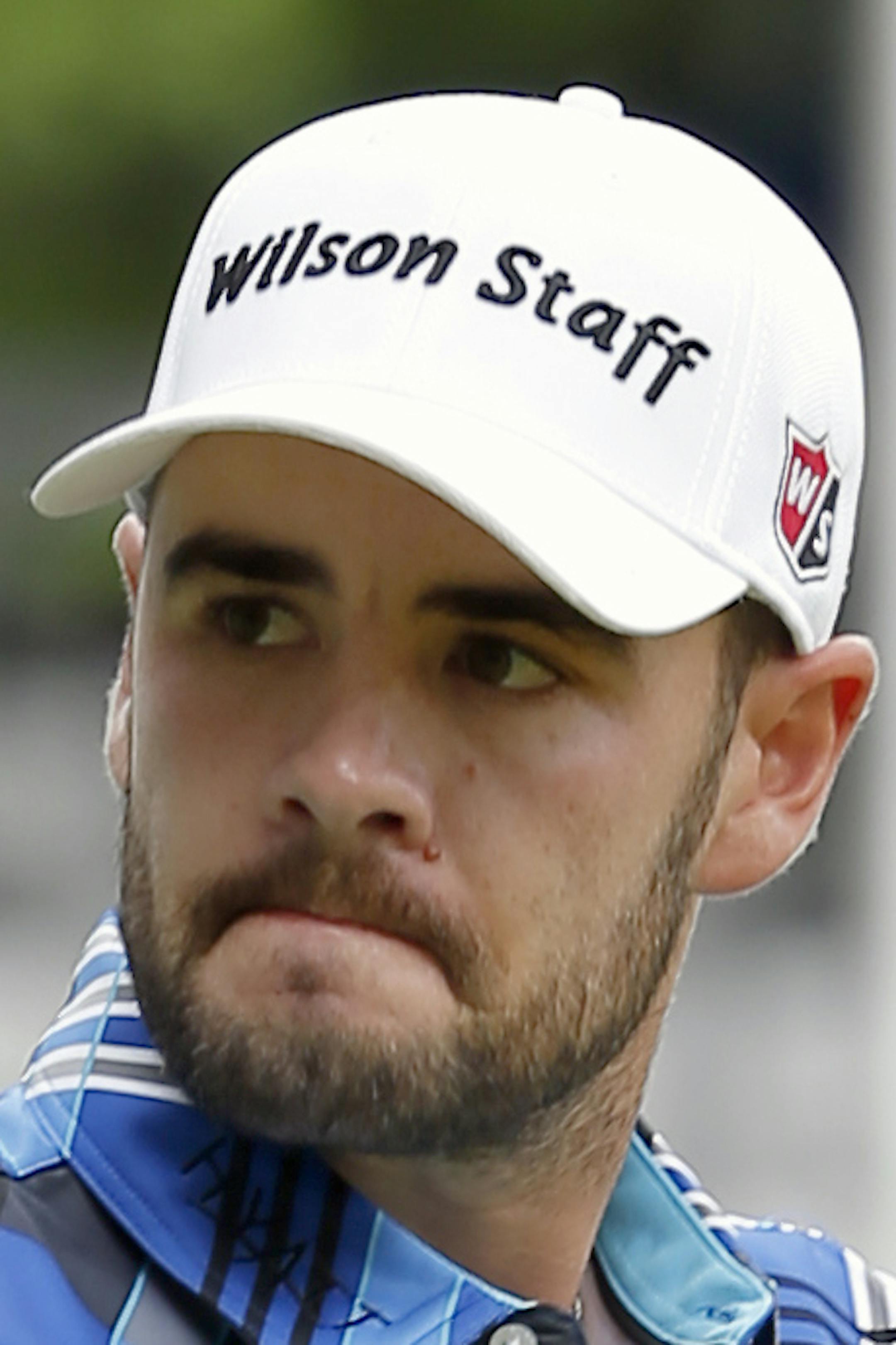 Troy Merritt waves to the crowd after making a birdie putt on 15th green during the second round of the RBC Heritage golf tournament in Hilton Head Island, S.C., Friday, April 17, 2015. (AP Photo/Stephen B. Morton)