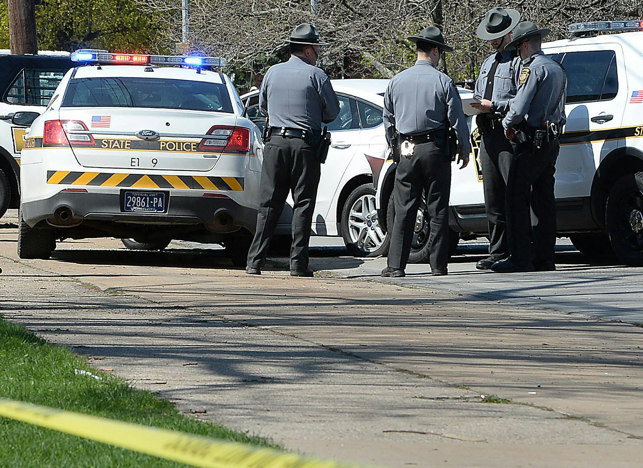 Pennsylvania State Police investigate the scene where Steve Stephens, the suspect in the random killing of a Cleveland retiree posted on Facebook, was found shot dead Tuesday, April 18, 2017, in Erie. Pa. Acting on a tip, Pennsylvania State Police spotted Stephens, 37, in Erie County, in the state's northwest corner, and went after him. After a brief chase, he took his own life, authorities said. (Greg Wohlford/Erie Times-News via AP)