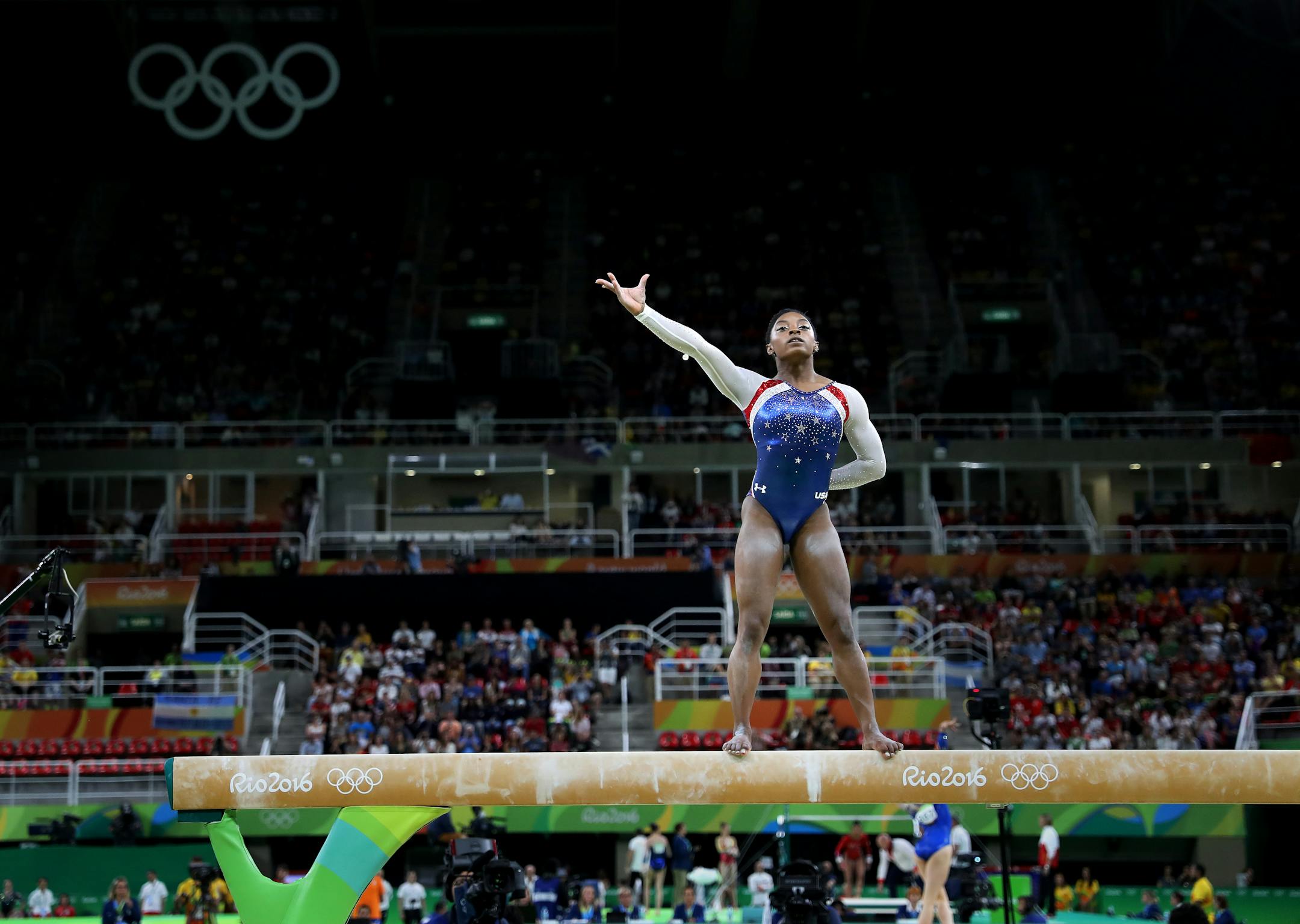 USA's Simone Biles won the all-around title in women's gymnastics and her teammate Aly Raisman took home the silver.