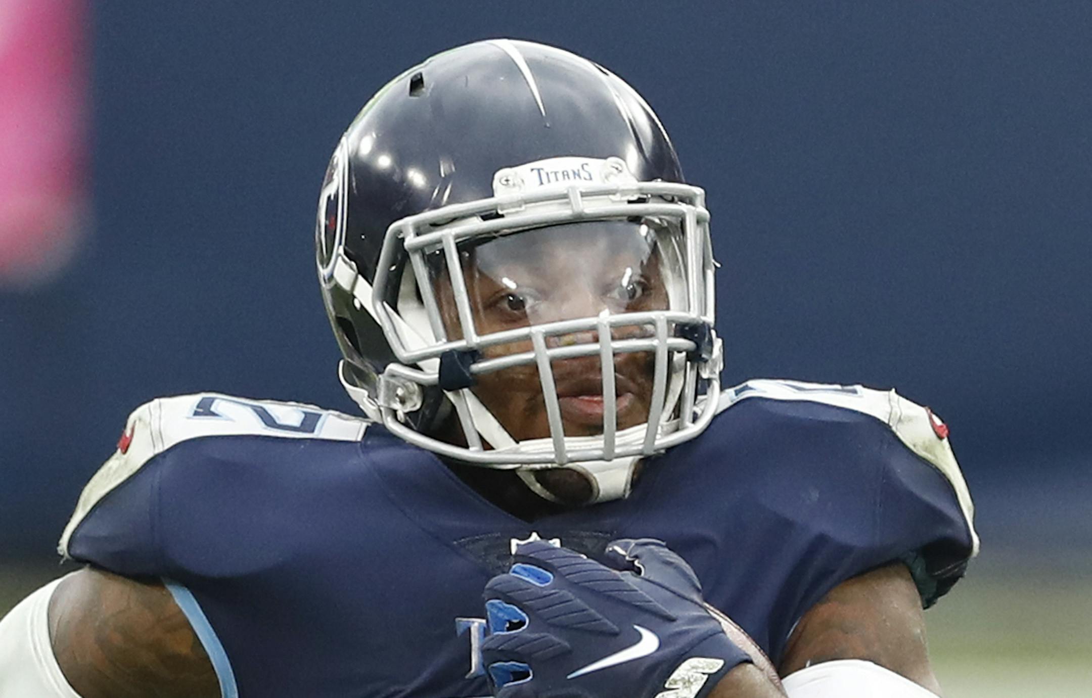 Tennessee Titans running back Derrick Henry (22) beats Houston Texans strong safety Justin Reid (20) as Henry runs 94 yards for a touchdown in the second half of an NFL football game Sunday, Oct. 18, 2020, in Nashville, Tenn. (AP Photo/Wade Payne)