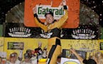 Brad Keselowski celebrated in Victory Lane after winning the NASCAR Cup Series race at Darlington (S.C.) Raceway on Sunday.