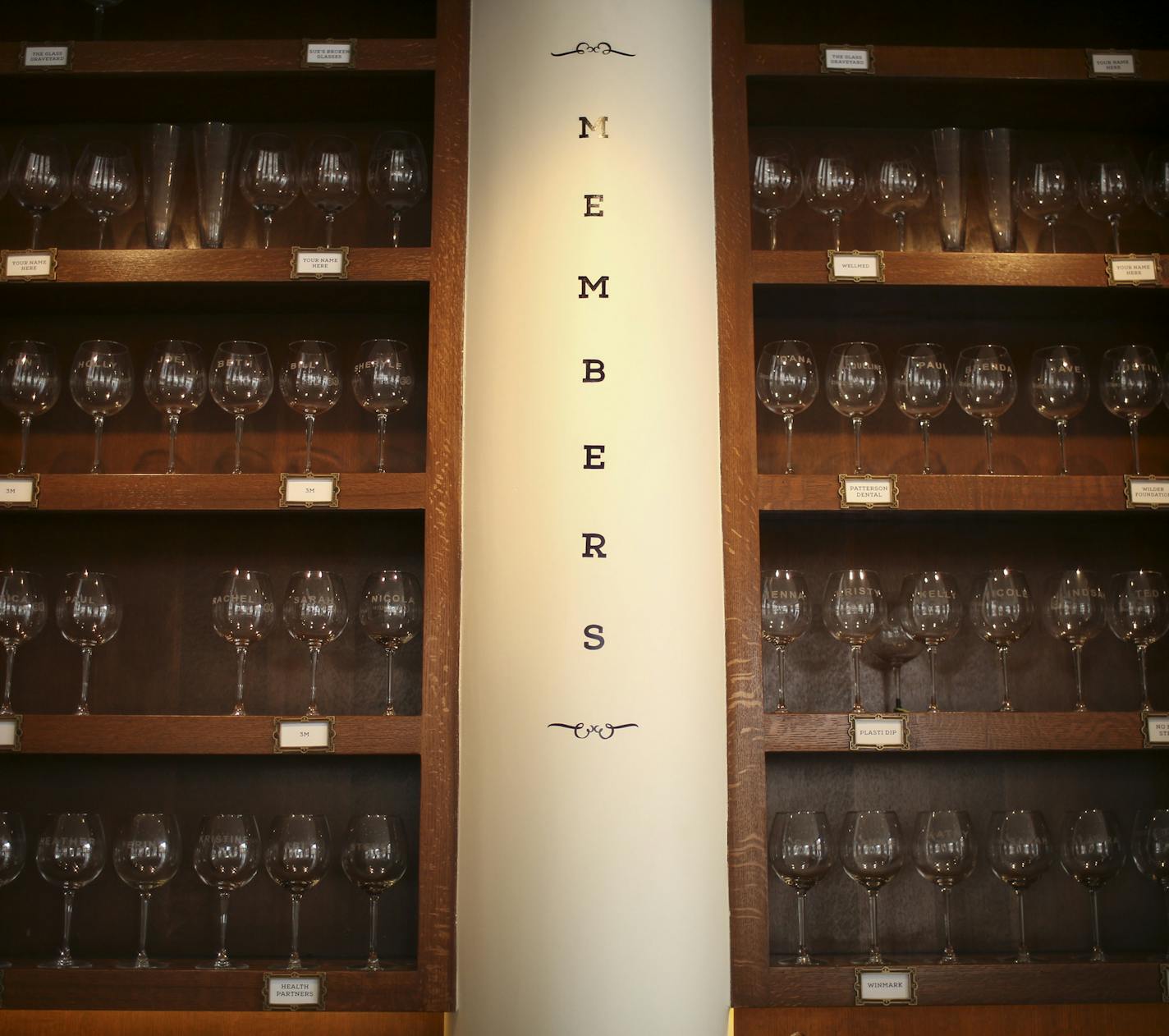 A focal point of the room is the wall of glasses behind the bar in the Truth Bar, the new Kruskopf & Co. workspace Wednesday afternoon. It's an agency tradition that every client has a wine glass with their name engraved on it. The shelves showcase those glasses. ] JEFF WHEELER &#x2022; jeff.wheeler@startribune.com Sue Kruskopf, CEO of the ad agency Kruskopf & Co. figured the world didn't need another conference room, so when she decided to expand her business' footprint in the Flour Exchange bu