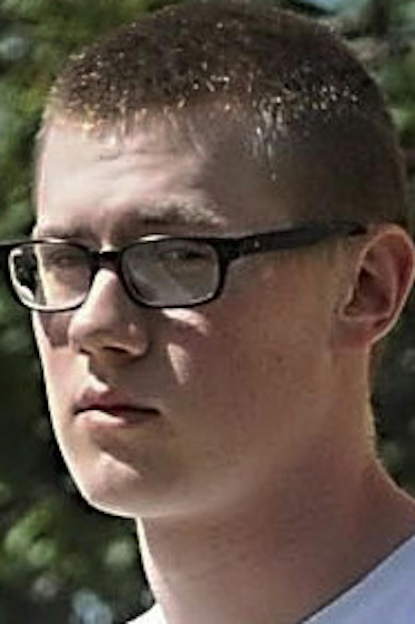 John LaDue and his father David leave the Waseca County Courthouse after a hearing Tuesday, July 26, 2016, in Waseca, Minn. John LaDue a Waseca teenager who planned an attack at his school in 2014 has been released from his probation, and in exchange, he has accepted a felony conviction on his record. (Pat Christman/The Free Press via AP)