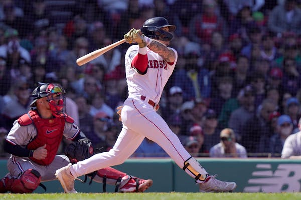 Boston’s Jarren Duran follows three on his two-run double in the third inning Thursday.