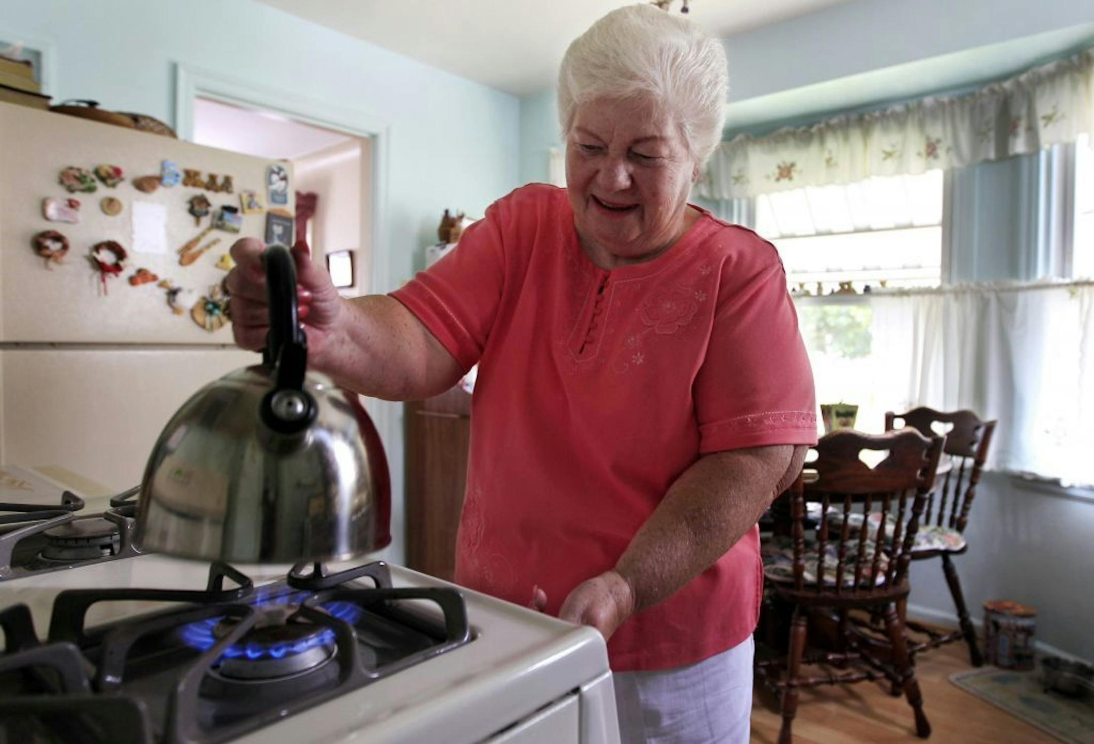 In this photo taken July 26, 2012, Marge Youngs is shown in her home in Toledo, Ohio. As millions of baby boomers flood Social Security with applications for benefits, the program's $2.7 trillion surplus is starting to look small. For nearly three decades Social Security produced big surpluses, collecting more in taxes from workers than it paid in benefits to retirees. The surpluses also helped mask the size of the budget deficit being generated by the rest of the federal government. Those days