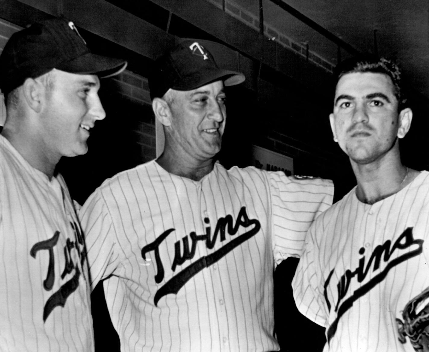 June 23, 1961 New Twin Manager Wins Game — Sam Mele (center),who late today was named manager of the Minnesota Twins,congratulates pitcher Camilo Pascual (right) who gave up six hits to the New York Yankees struck out eight,and Harmon Killebrew after their 4-0 shutout in the American League game in Twin Cities tonight. Killebrew got a single,double and a two-run homer to drive in four runs. Mele took over from Cookie Lavagetto who was fired. Geh, AP Wirephoto ORG XMIT: MIN2017050320461590