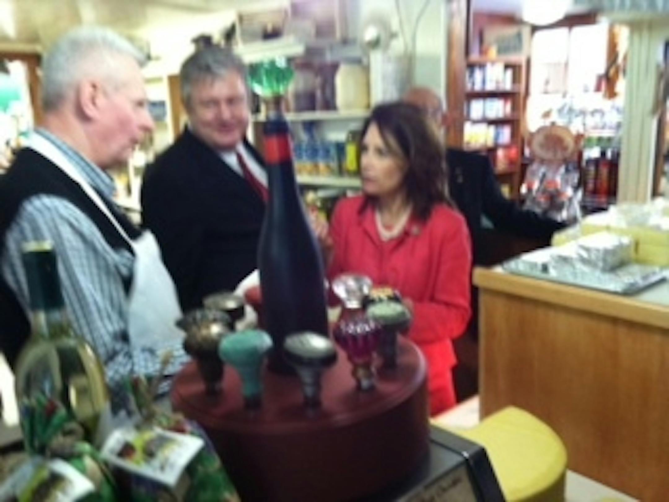 Michele and Marcus Bachmann talk to a New Hampshire grocer