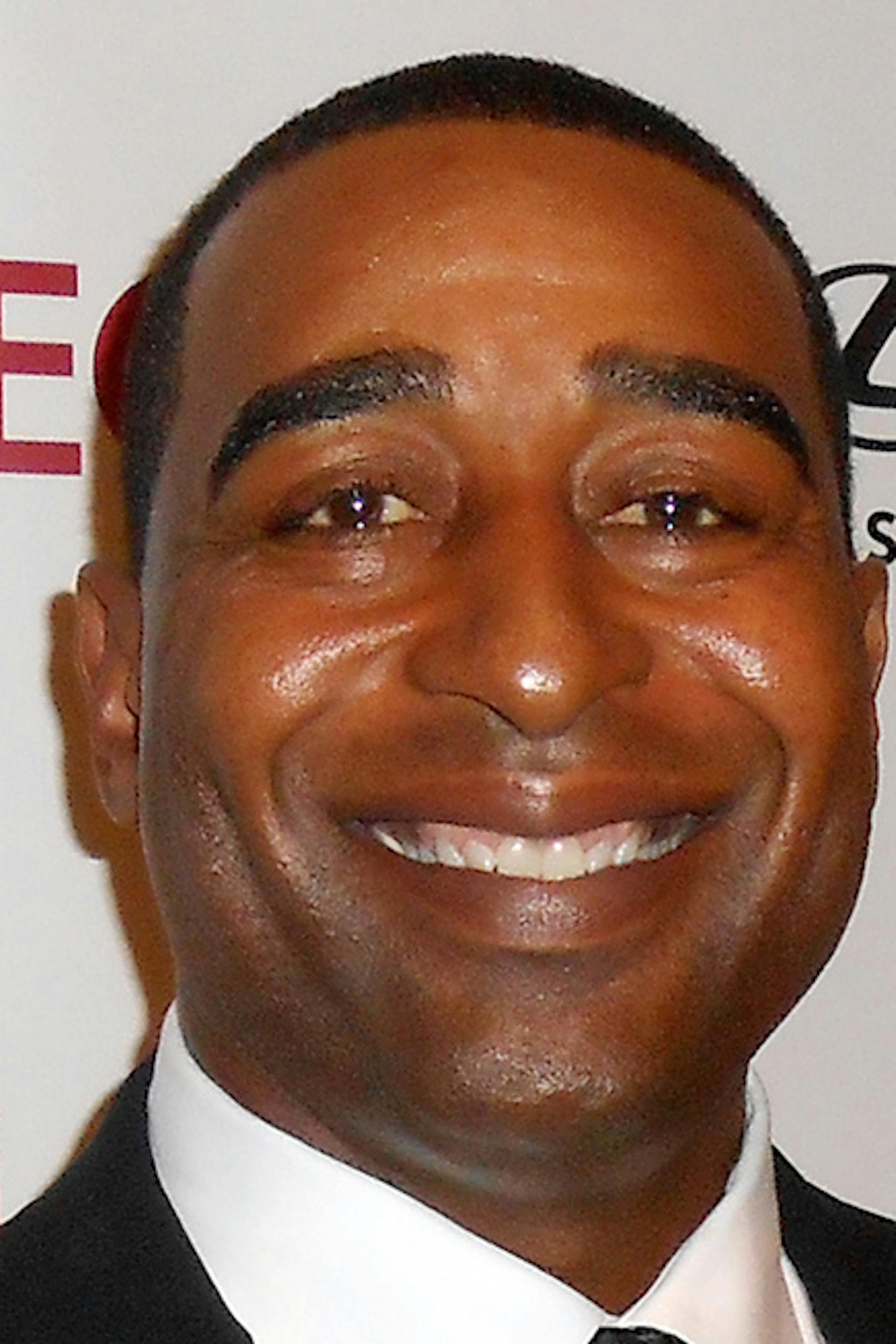 Cris Carter, former player for the Minnesota Vikings and Philadelphia Eagles, attends the 27th annual Lombardi Gala at the Washington Hilton in Washington, D.C., U.S., on Saturday, Nov. 2, 2013. The event raised $700,000 for the Georgetown Lombardi Comprehensive Cancer Center in the name of Vince Lombardi, late coach of the Green Bay Packers. Photographer: Stephanie Green/Bloomberg *** Local Caption *** Cris Carter ORG XMIT: 159076407
