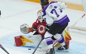 Frost forward Britta Curl-Salemme scores on Ottawa goalie Gwyneth Philips during the third period Thursday.