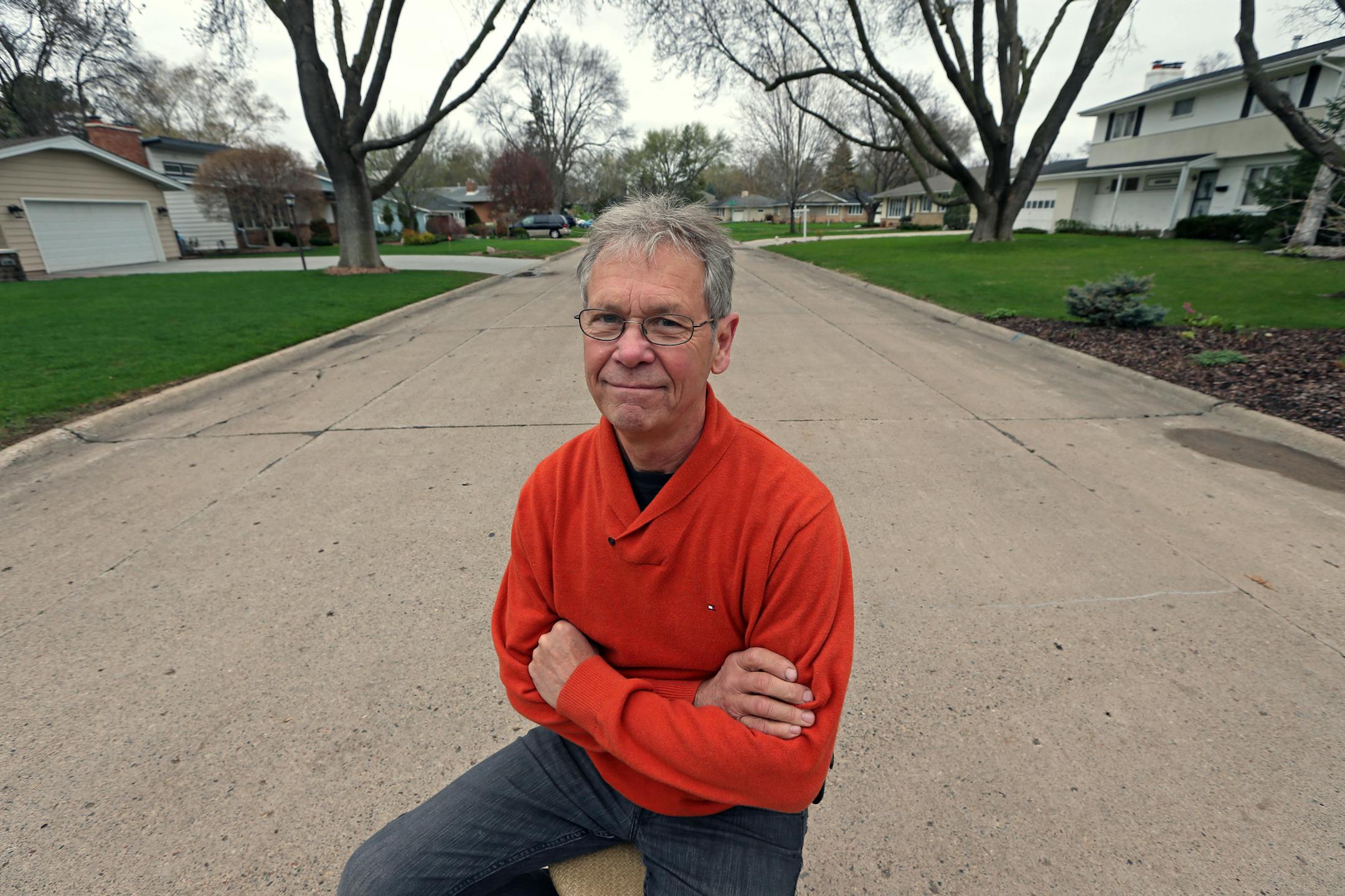 Edina resident Judd Rietkerk thinks having a concrete street in front of his home is just fine, but the city is tearing out the aged concrete on Tingdale Lane and replacing it with asphalt.
