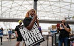 LaTosha Brown, co-founder of Black Voters Matter, spoke at a protest directed toward Delta Air Lines at Hartsfield-Jackson Atlanta International Airpo