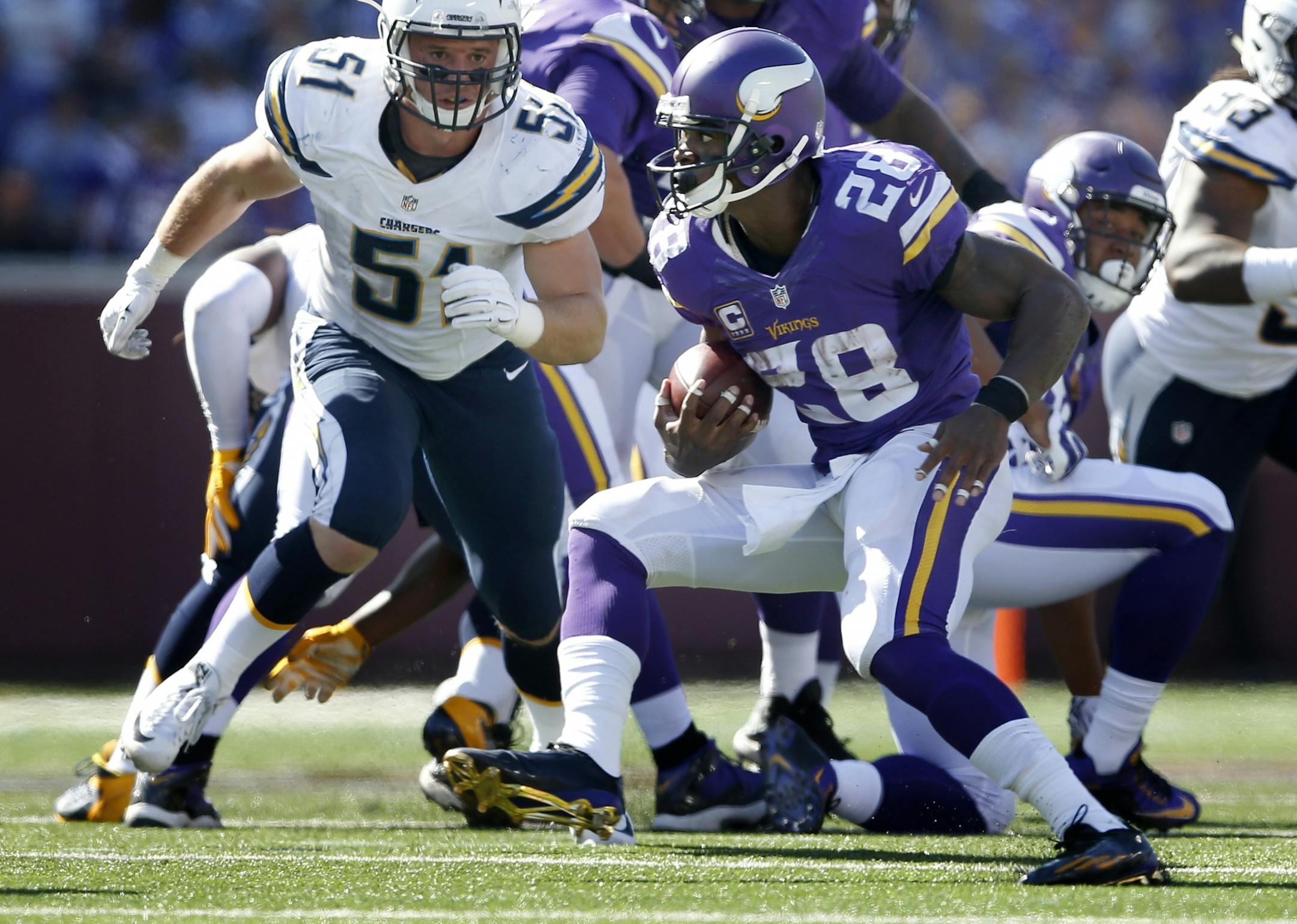 Minnesota Vikings running back Adrian Peterson (28) during a run in the third quarter.