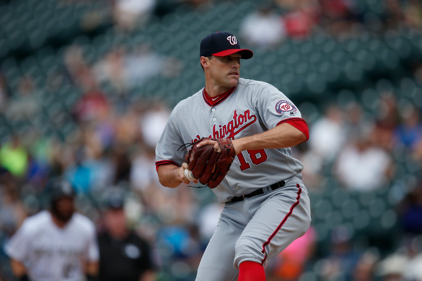 Washington Nationals relief pitcher Matt Belisle (18) in the fifth inning of a baseball game Wednesday, Aug. 17, 2016 in Denver. Colorado won 12-10. (AP Photo/David Zalubowski)