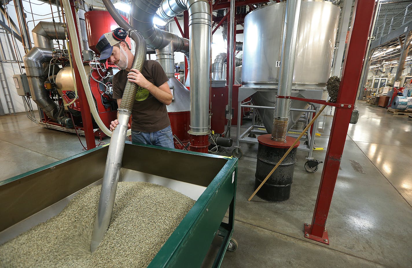 Cameron's Matthew Daugherty, roasted beans at the plant, Wednesday, September 14, 2016 in Shakopee, MN. In 2009, Cameron's Coffee designed a brand new state-of-the-art coffee processing and packaging facility in Shakopee. The in-home coffee brand has increased sales 350% since 2009. ] (ELIZABETH FLORES/STAR TRIBUNE) ELIZABETH FLORES &#x2022; eflores@startribune.com