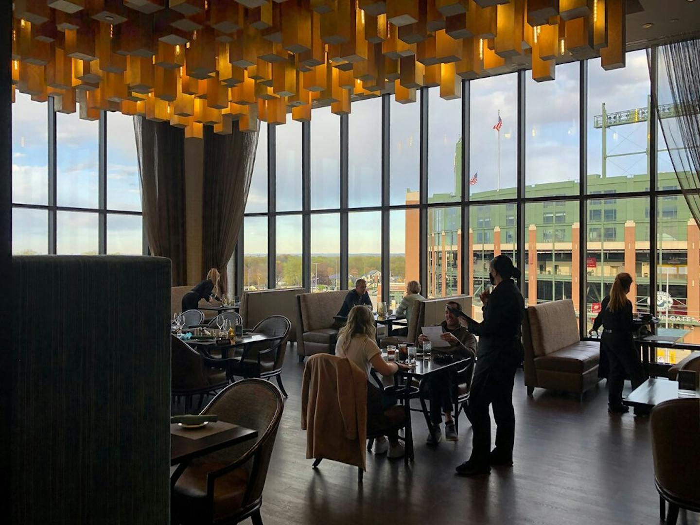 Grab a drink or a dinner at Taverne in the Sky, located on the fourth floor of Lodge Kohler, with views of Lambeau Field in Green Bay, Wis.