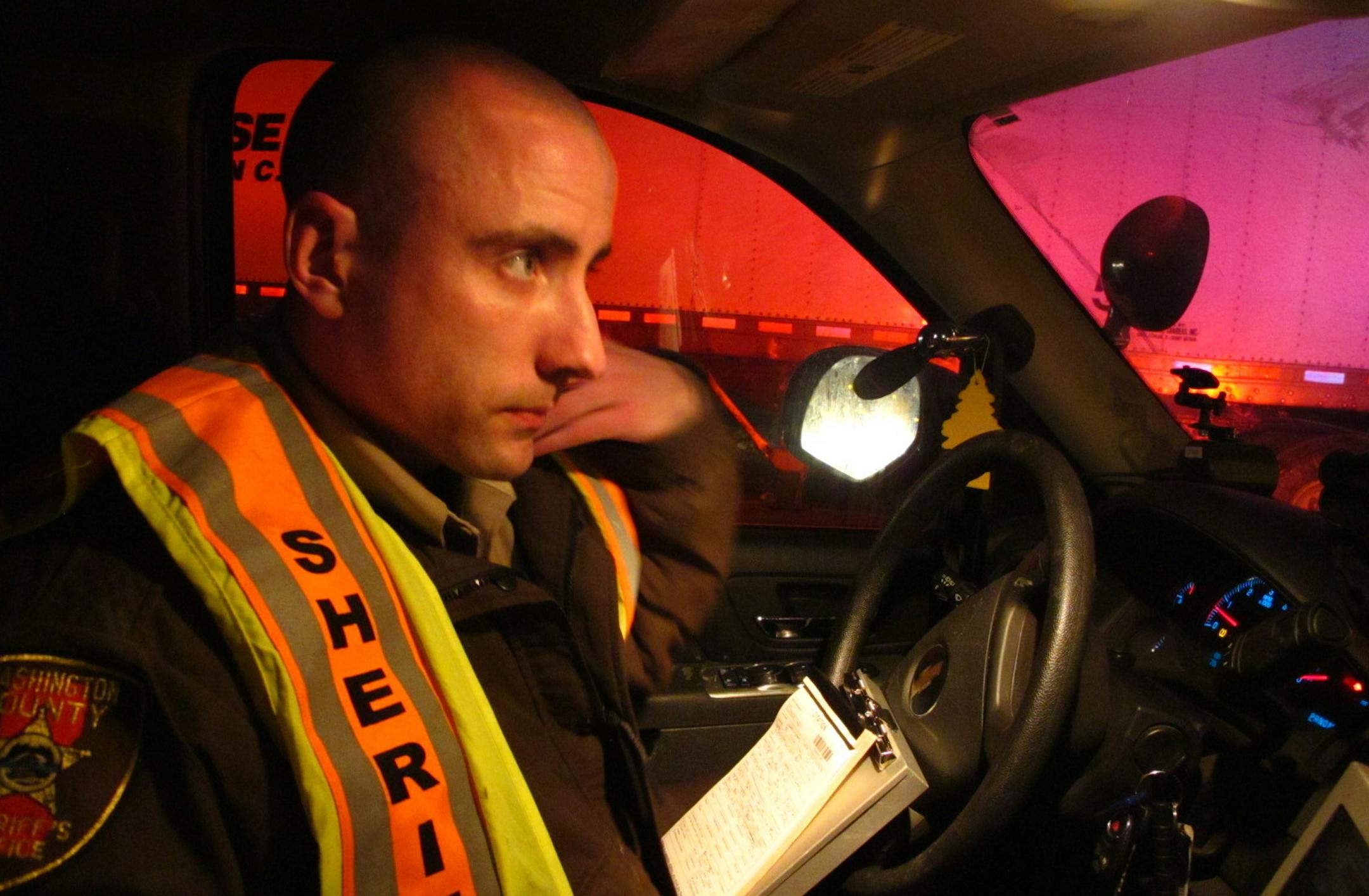 Deputy Joel Legut of the Washington County Sheriff's Office works an accident scene on Interstate 94 at Afton and West Lakeland Township last week.